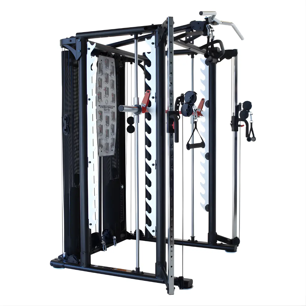 Zwart-witte Inspire fitnessmachine. Het heeft meerdere katrollen en gewichtsopzetstukken. Een optrekstang staat bovenaan.