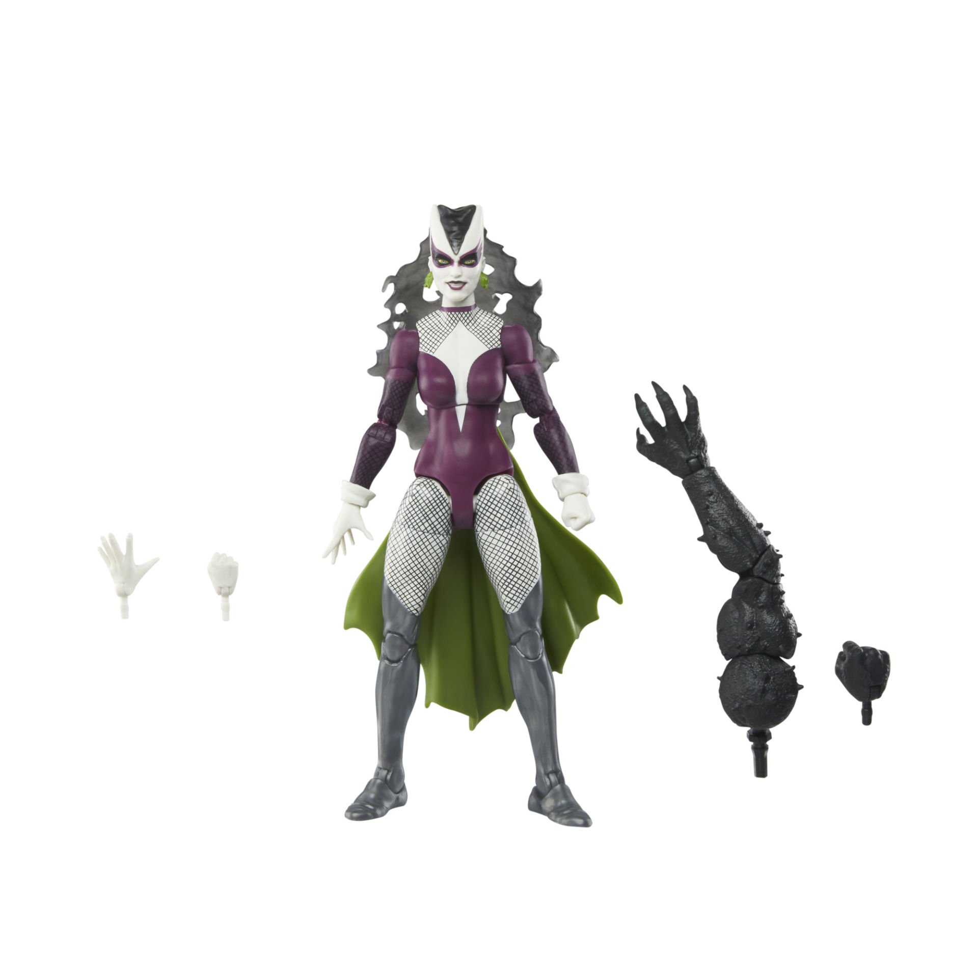 Figura de acción femenina con traje morado y blanco, capa verde y brazo negro extra. La figura está sobre fondo blanco.