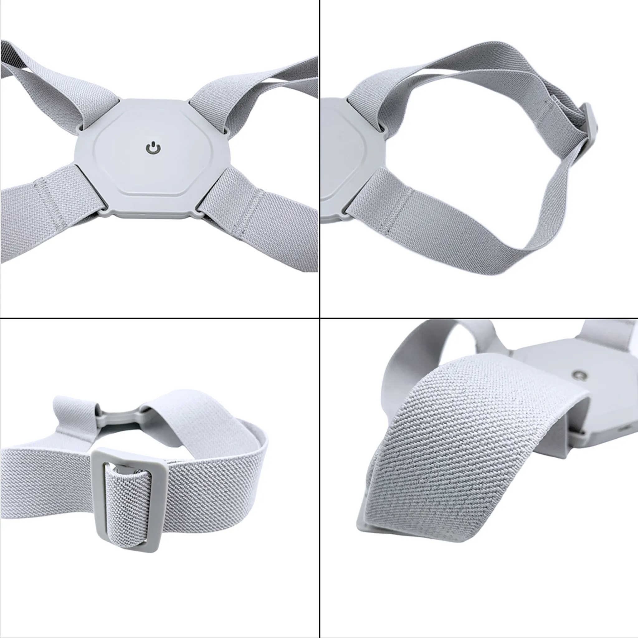 Grauer Haltungskorrektor mit elastischen Trägern und zentralem Bedienfeld. Das Design umfasst verstellbare Schnallen und einen Power-Knopf.