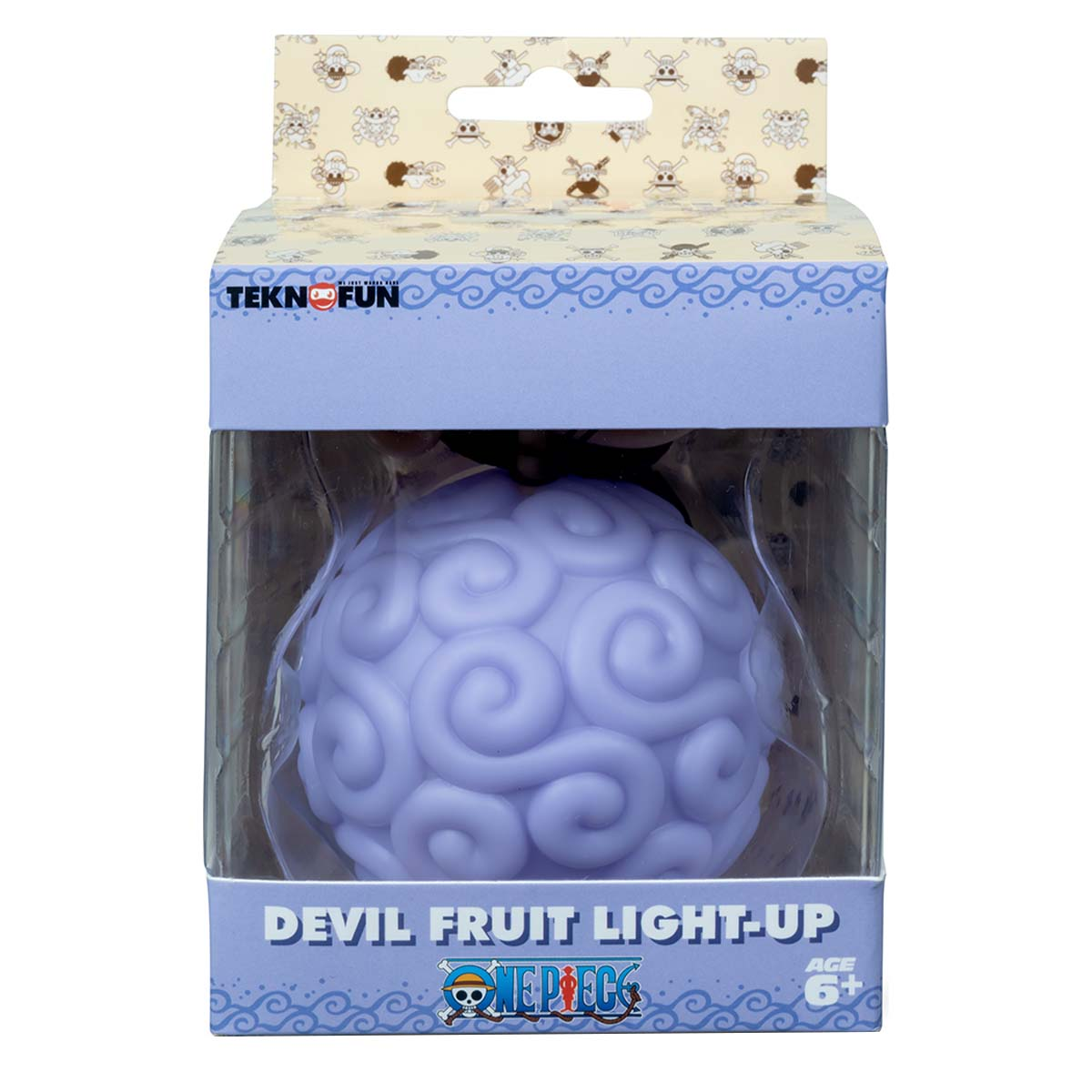 Un giocattolo viola a forma di Frutto del Diavolo a spirale è in una scatola. La scatola ha il marchio 'Devil Fruit Light-Up' e 'One Piece'.