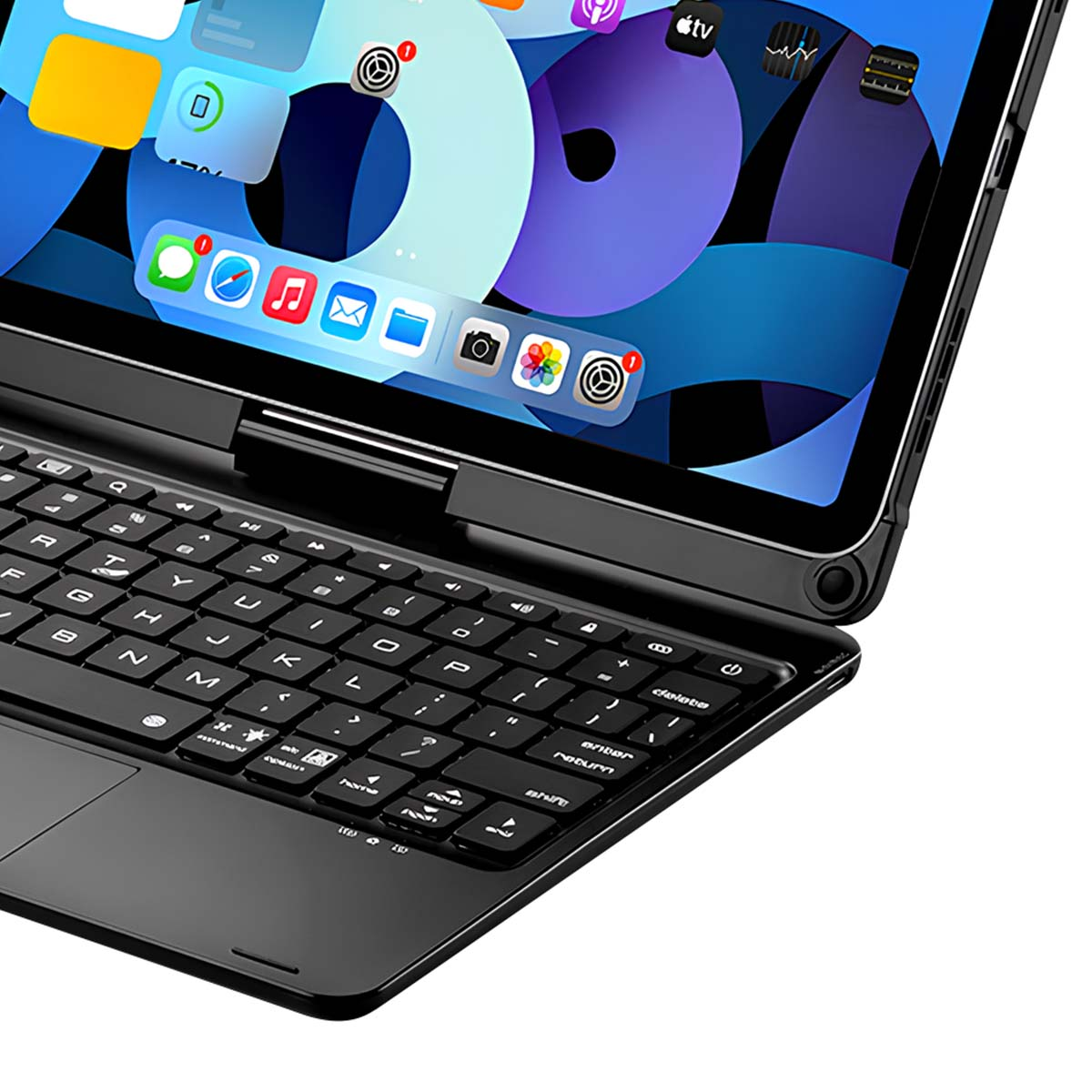 Tableta negra con teclado conectado. La pantalla muestra iconos de aplicaciones sobre un fondo azul y blanco. El teclado es negro.
