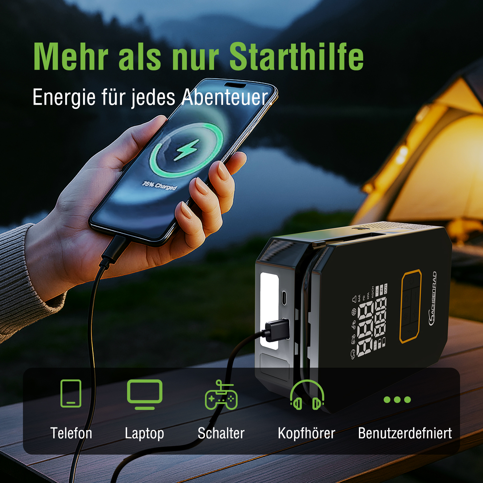 Eine Hand hält ein Telefon, das von einer schwarzen Powerstation geladen wird, mit Symbolen: Telefon, Laptop, Spiel, Kopfhörer.