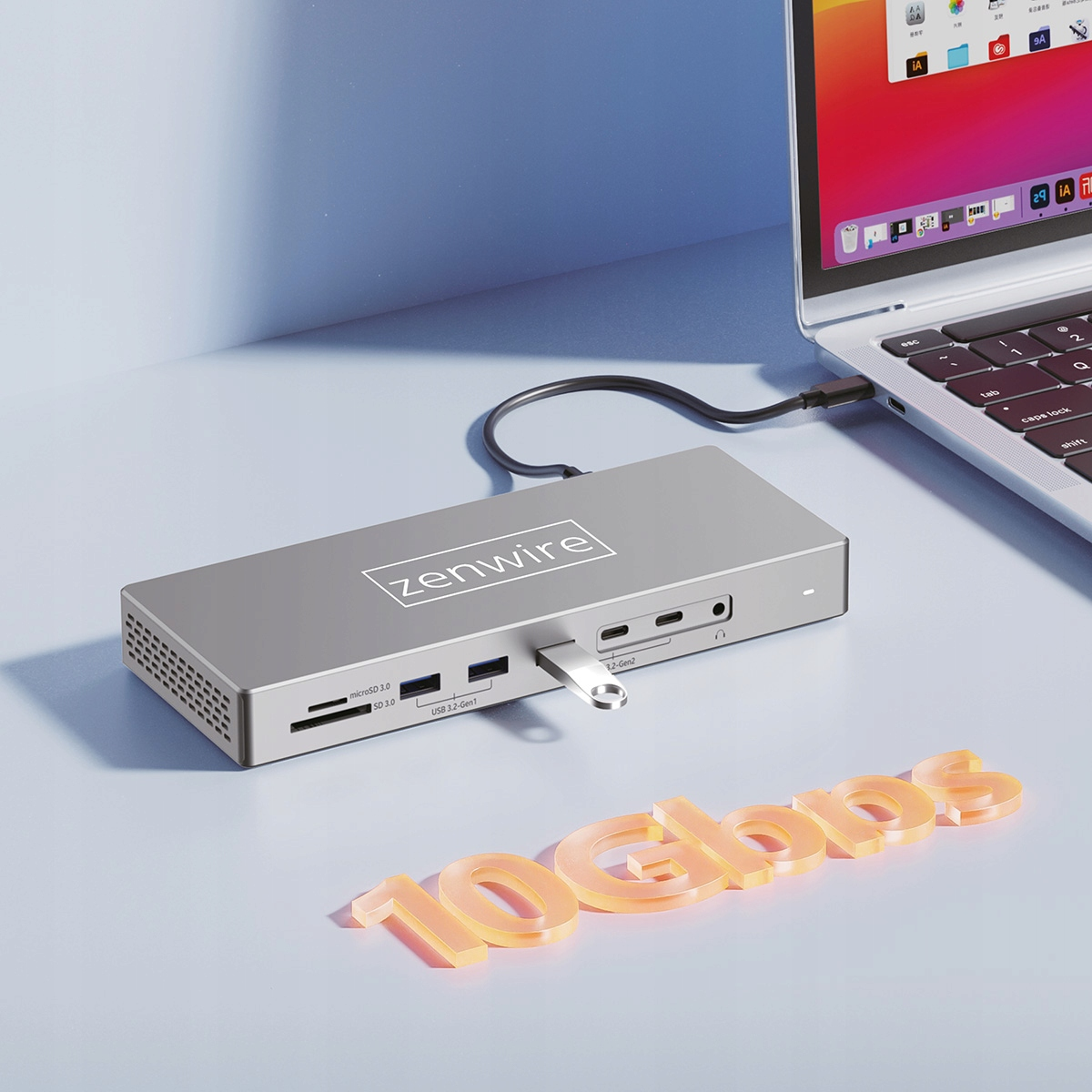 Srebrny hub Zenwire jest podłączony do laptopa. Hub ma wiele portów, a słowa "10 Gbps" są widoczne.