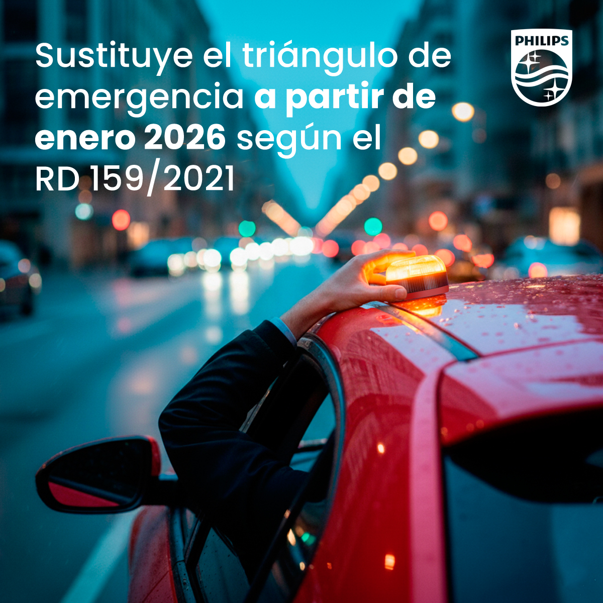 Una mano sosteniendo una luz de emergencia en un coche rojo. Texto en español menciona un reemplazo a partir de enero de 2026.