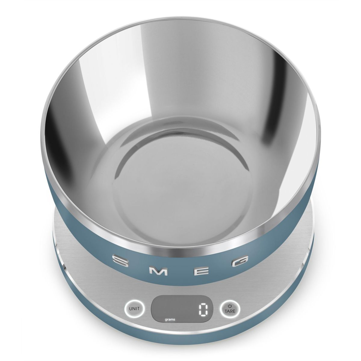 Una báscula de cocina azul y plateada con un cuenco de acero inoxidable. La pantalla muestra '0' gramos. La marca es 'SMEG'.
