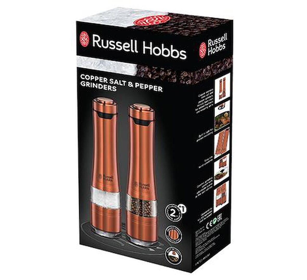 Bir Russell Hobbs kutusu, bakır tuz ve karabiber değirmenlerini gösteriyor. Birinde tuz, diğerinde karabiber var. Kutu, ürün detaylarıyla siyah.