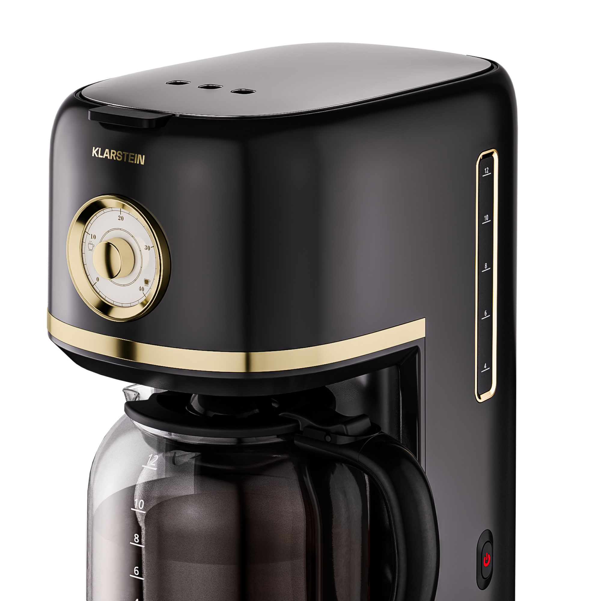 Caffettiera nera e oro, caraffa in vetro. Timer e indicatore livello acqua. Pulsante di accensione sul lato.