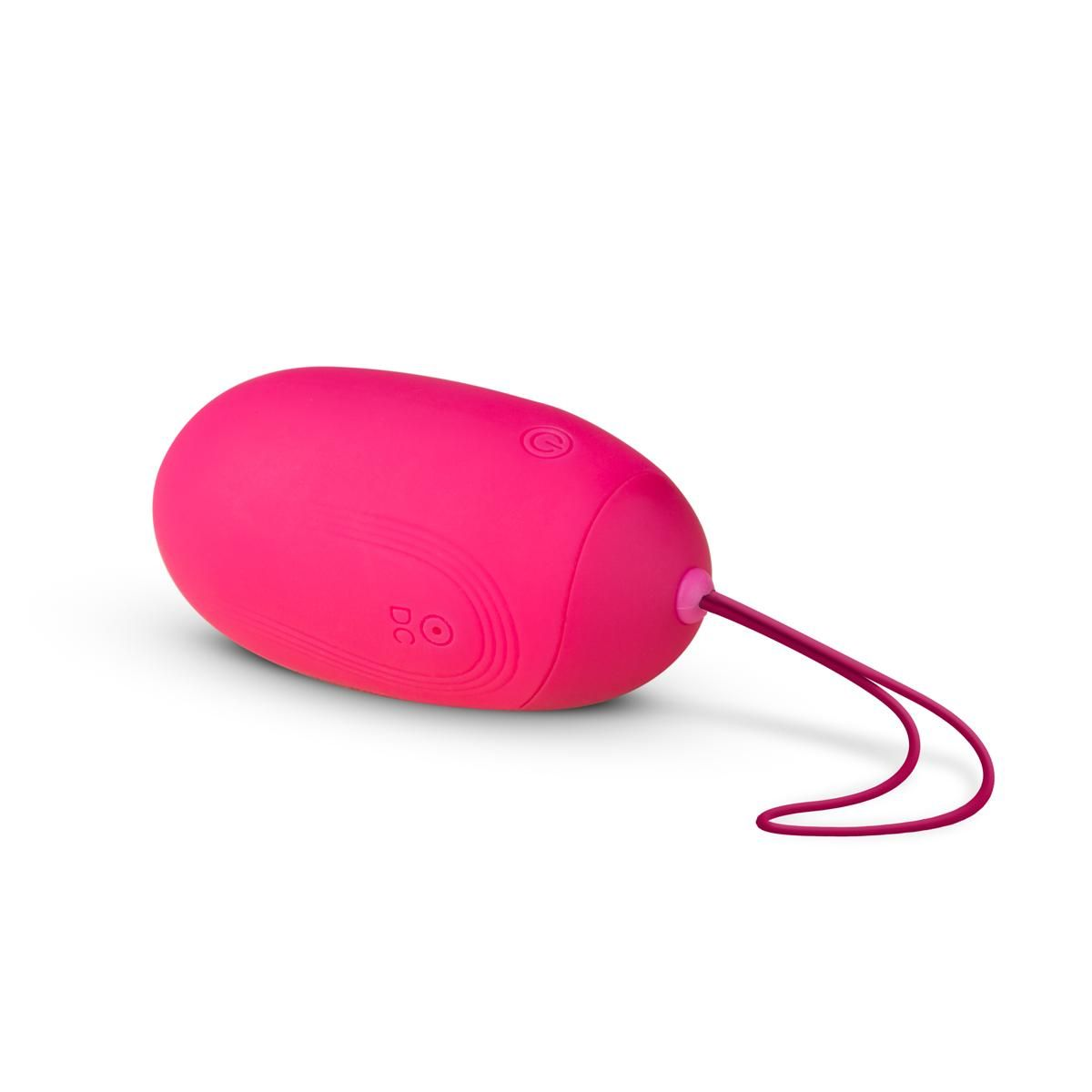 Ein rosa, eiförmiger Vibrator mit Schlaufe. Er hat eine Ein-/Aus-Taste, DC-Markierungen und eine kleine Taste. Der Hintergrund ist weiß.