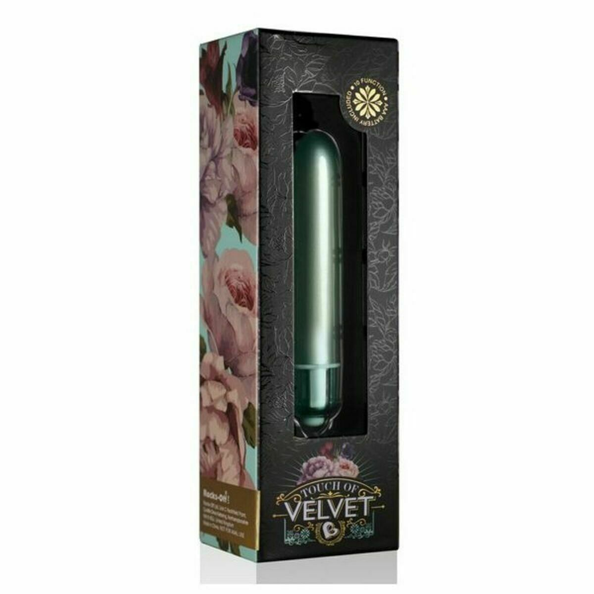 Ein grüner Vibrator wird in einer schwarzen Schachtel mit Blumenmustern präsentiert. Auf der Schachtel steht 'Touch of Velvet'.