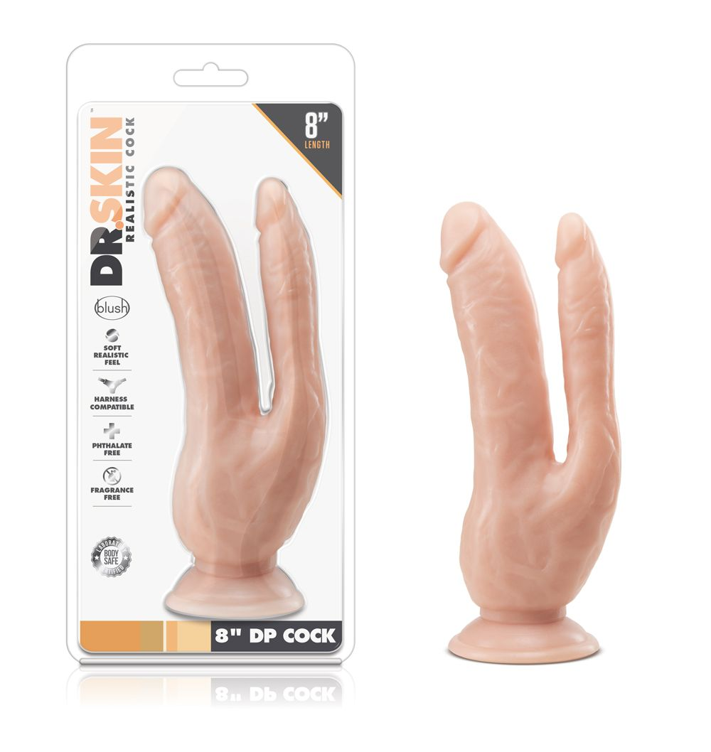 Ein fleischfarbener, doppelseitiger Dildo wird auf weißem Hintergrund gezeigt. Er befindet sich in einer Verpackung mit Text wie 'DR.SKIN'.