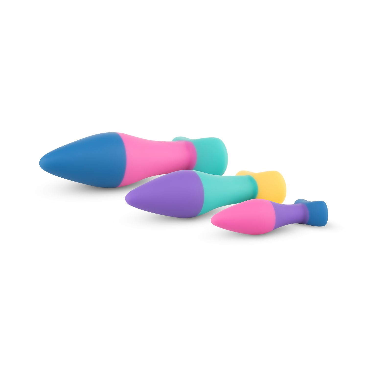 Drei farbige, kegelförmige Objekte in Blau, Rosa, Lila, Gelb und Grün, angeordnet auf weißem Hintergrund.