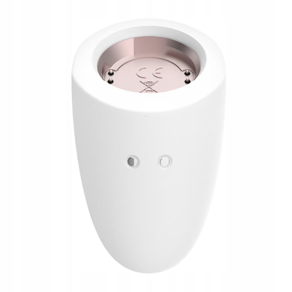 Białe, owalne urządzenie z dwoma małymi przyciskami i otworem z metalowym wnętrzem. Widoczny symbol CE.