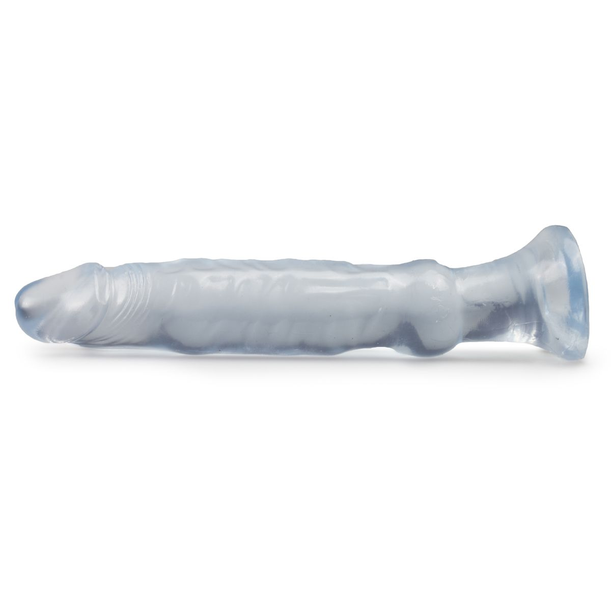 Ein durchsichtiges, blau getöntes Sexspielzeug, das einem Penis ähnelt, liegt auf weißem Grund. Es ist detailliert mit Rillen und einem ausgestellten Sockel.