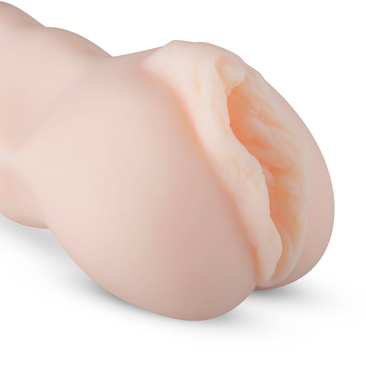 Nahaufnahme eines fleischfarbenen Sexspielzeugs, das einer Vagina ähnelt. Das Spielzeug befindet sich auf weißem Hintergrund.