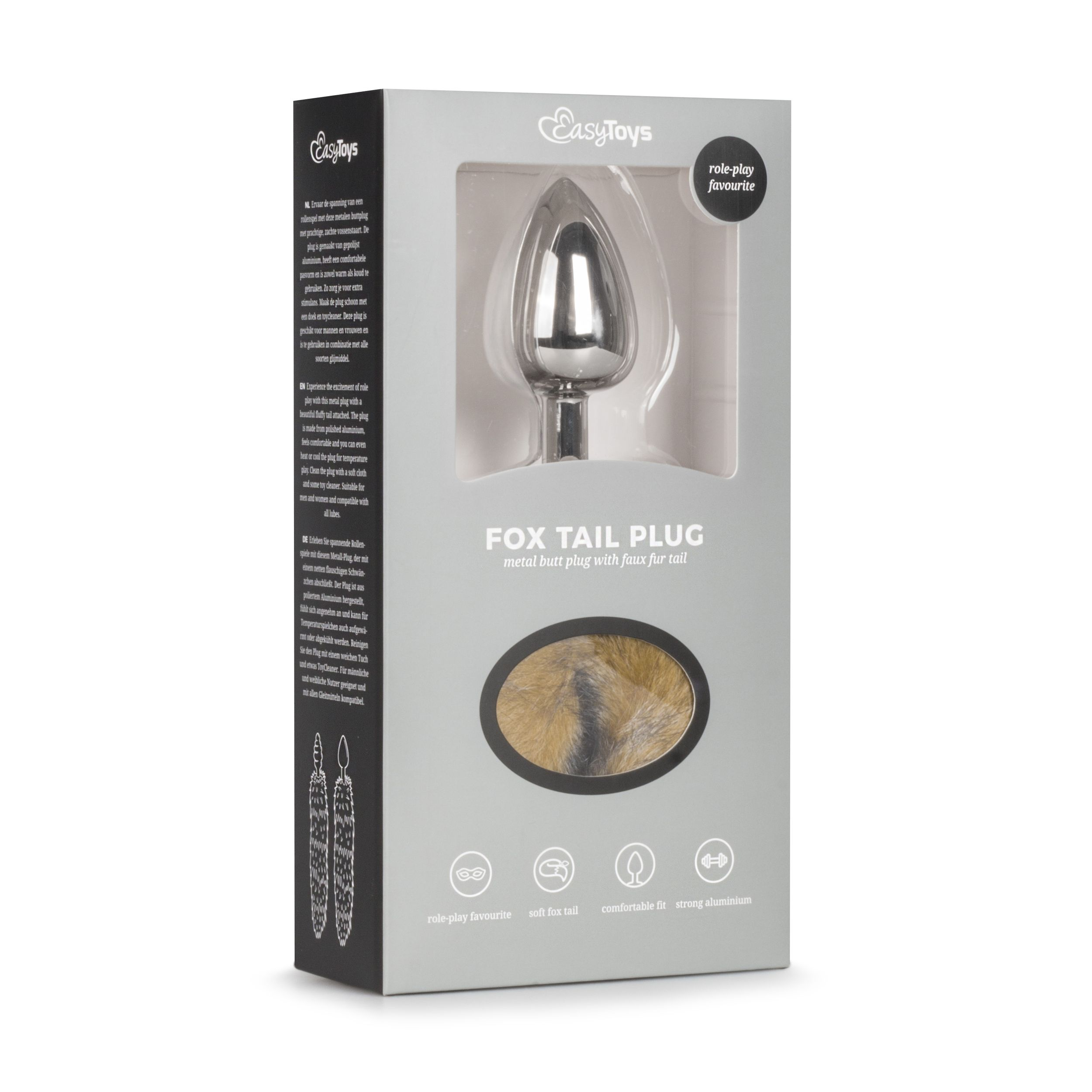 Ein Metall-Buttplug mit Fuchsschwanz auf der Verpackung. Die Box hat Text in mehreren Sprachen.