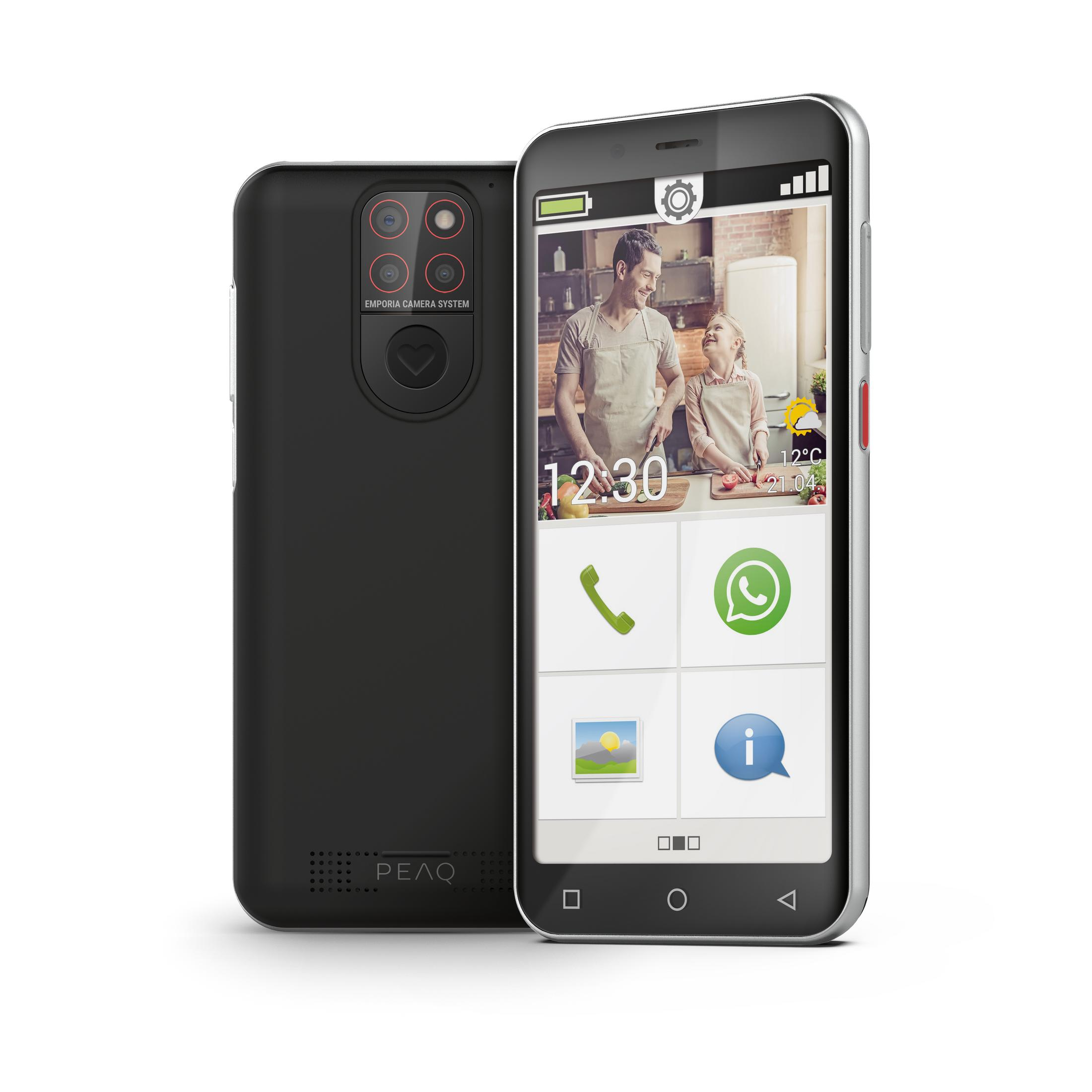 Ein Smartphone zeigt eine Familie in der Küche. Das Telefon hat eine schwarze Rückseite mit Kamera und einen silbernen Rahmen.