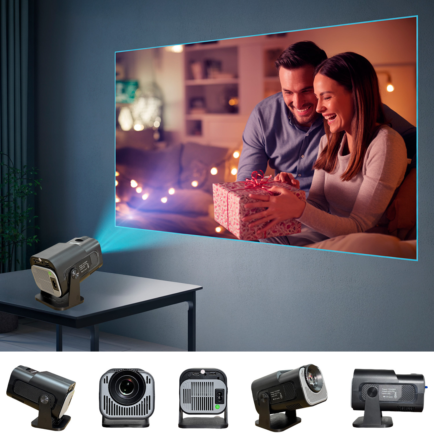 Projektor wyświetla obraz na ścianie pary uśmiechającej się i trzymającej prezent. Projektor stoi na stole.