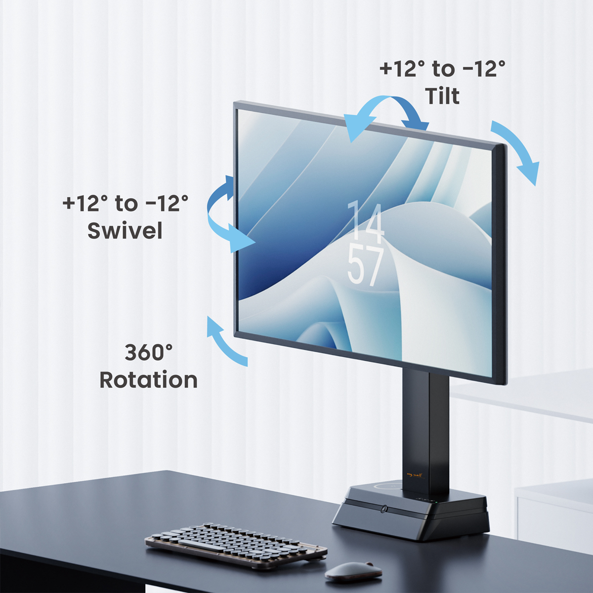 Un monitor su un supporto con capacità di rotazione, inclinazione e rotazione. Una tastiera e un mouse sono su una scrivania. Lo sfondo è una parete chiara.