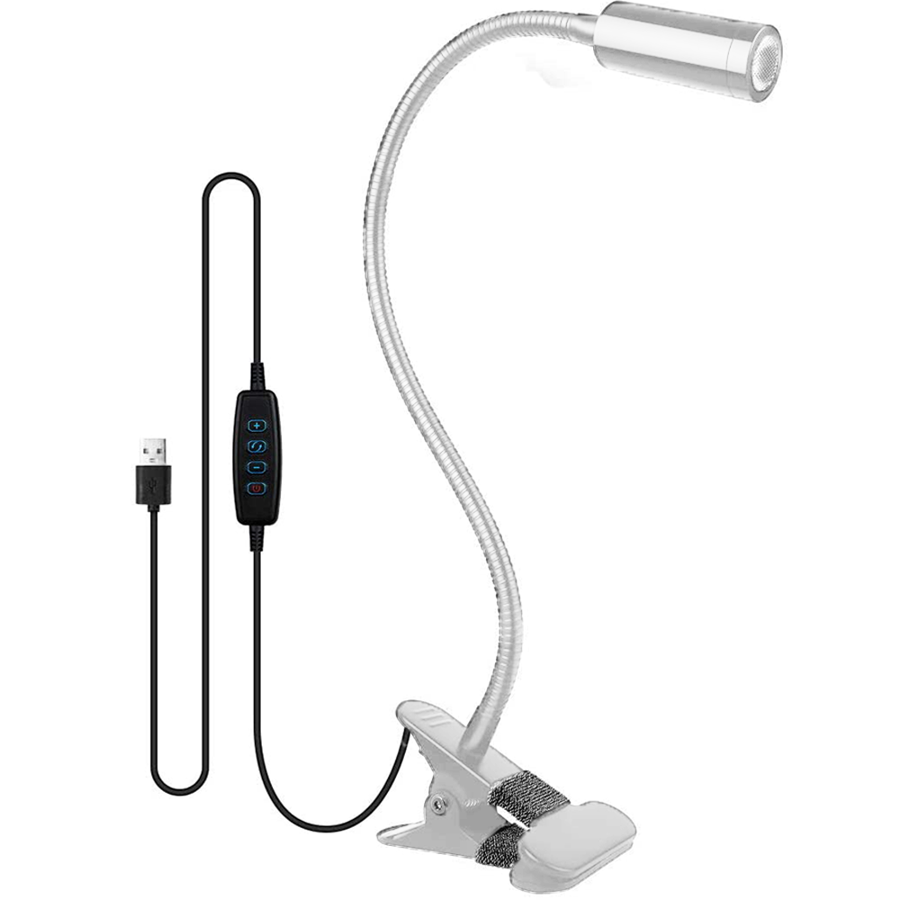 Eine flexible silberne LED-Schreibtischlampe mit Clip-Basis und USB-Netzkabel. Sie hat ein Bedienfeld für die Helligkeit.