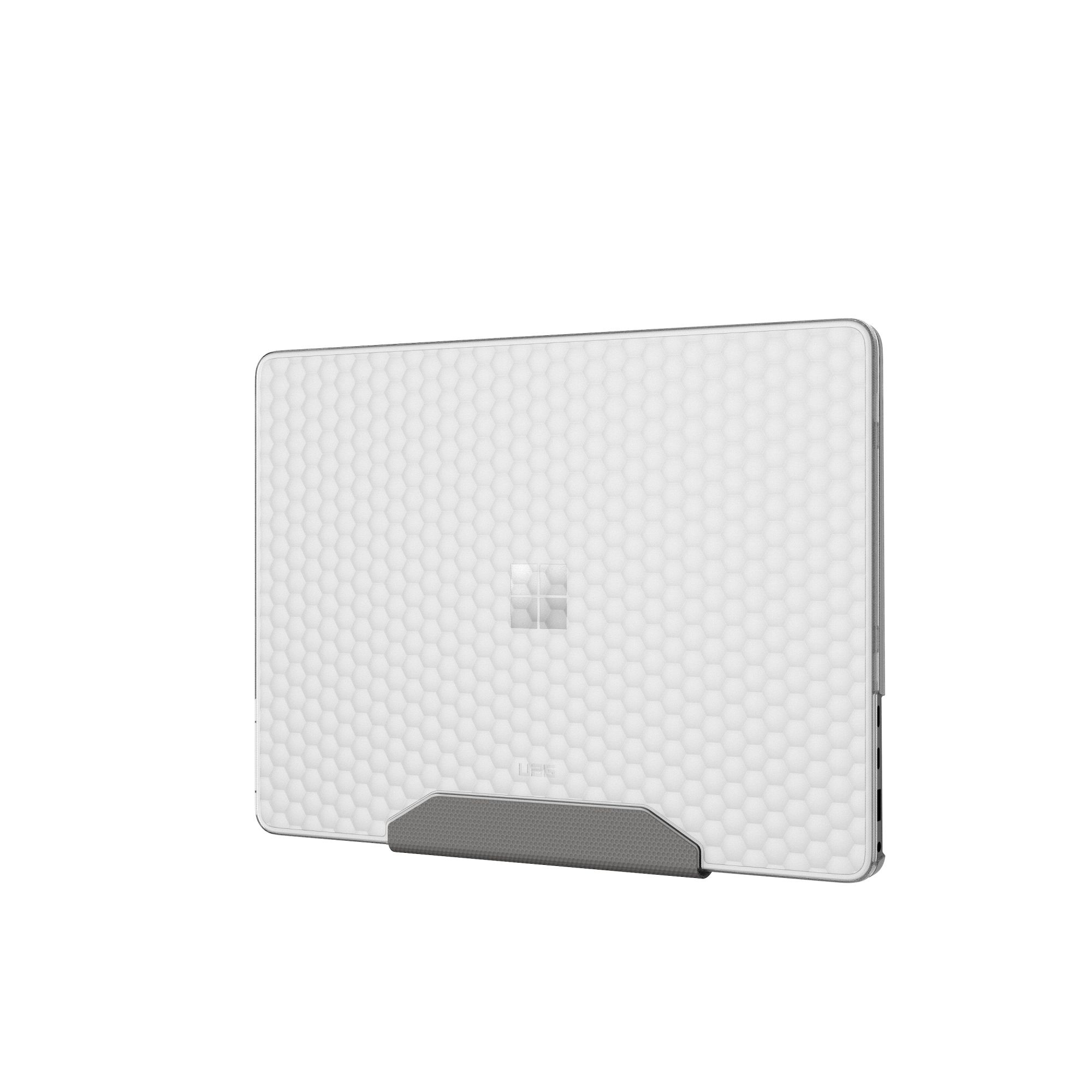 Eine weiße Laptop-Hülle mit Wabenmuster und einem grauen Ständer. Das Microsoft-Logo ist sichtbar. Isoliert auf Weiß.
