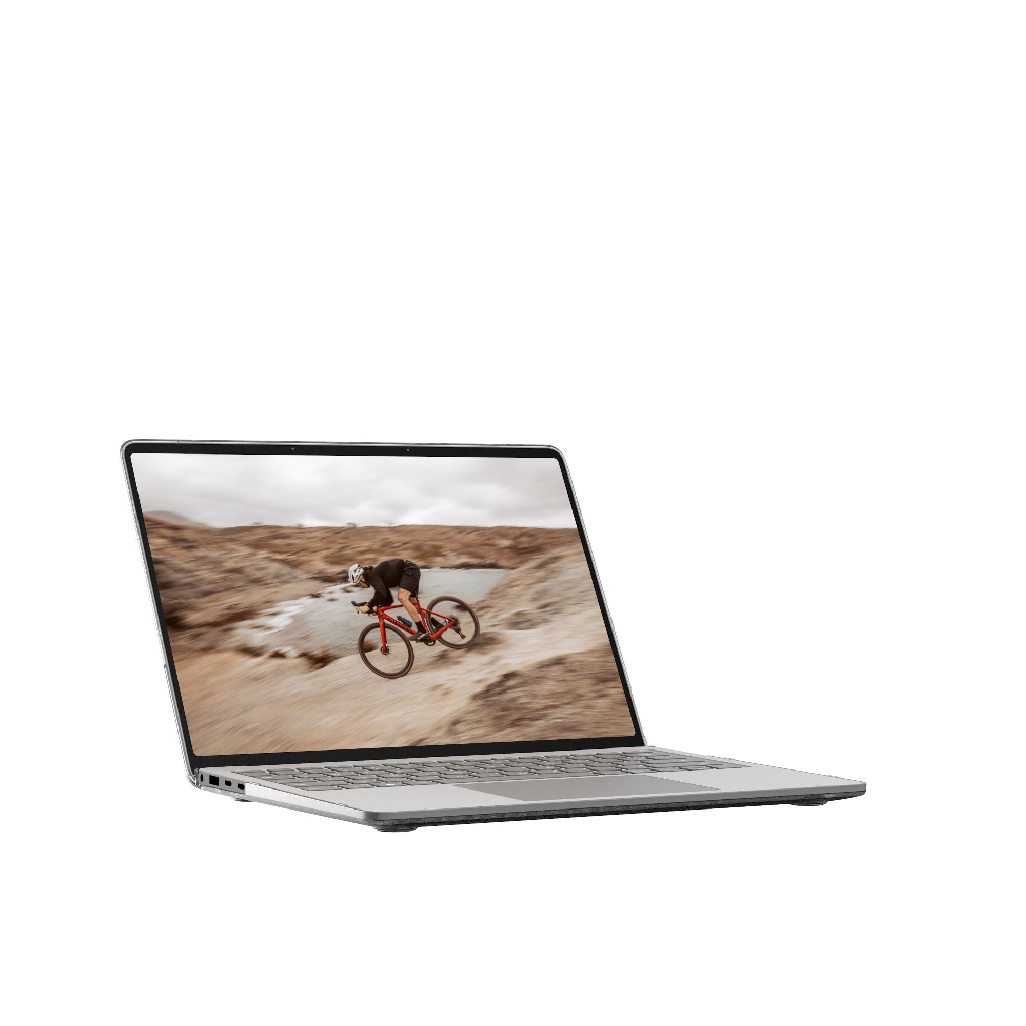 Ein Laptop zeigt einen Radfahrer auf einem roten Fahrrad. Der Radfahrer fährt auf felsigem Gelände. Der Laptop ist silbern.