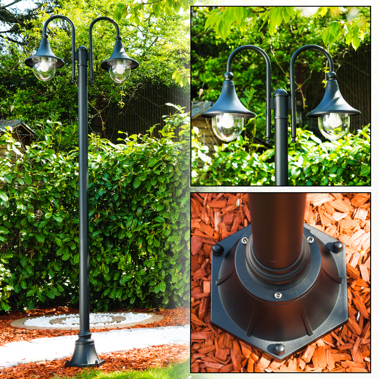 Eine schwarze Laterne mit zwei Lichtern in einem Garten mit Mulch, einer grünen Hecke und einem weißen Steinweg.