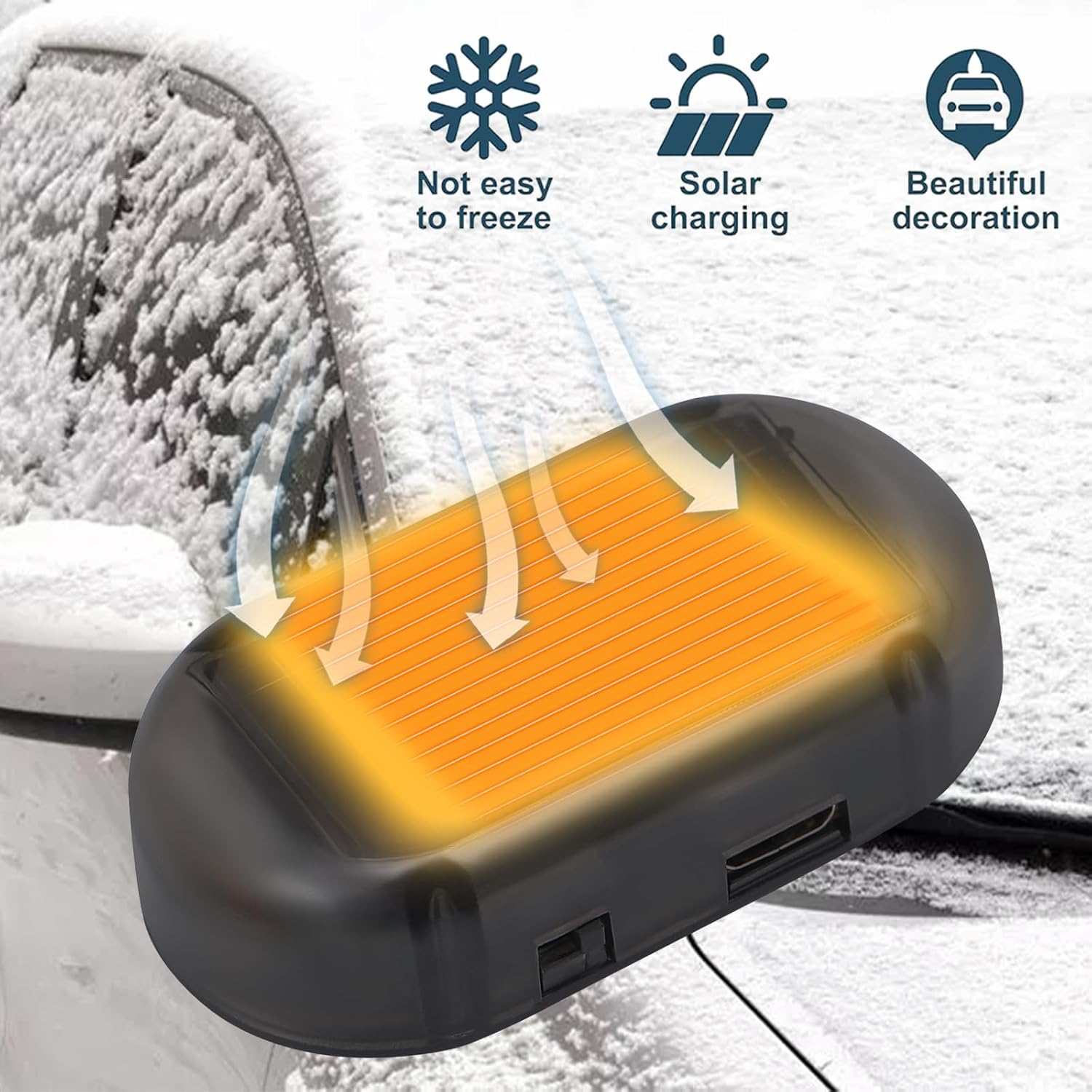 Ein schwarzes Gerät mit einem orangefarbenen Panel, platziert auf einem schneebedeckten Auto, mit Symbolen für Solarladung und Frostschutz.