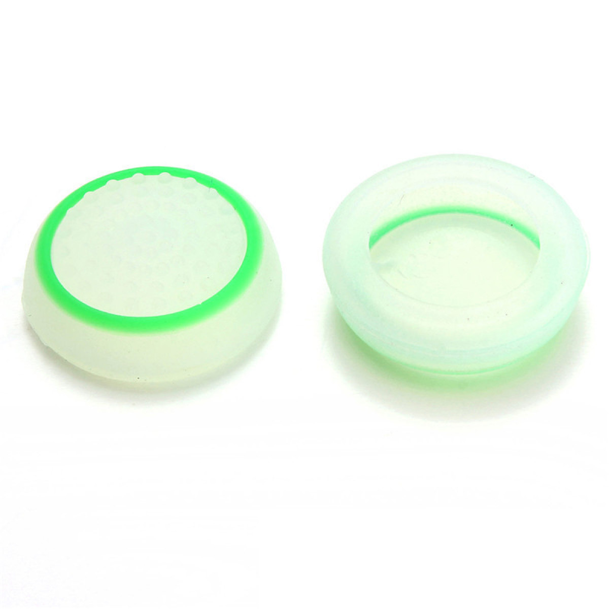 Due impugnature per pollice joystick verdi e bianche traslucide. Una con un anello verde, l'altra con una fascia verde all'interno.