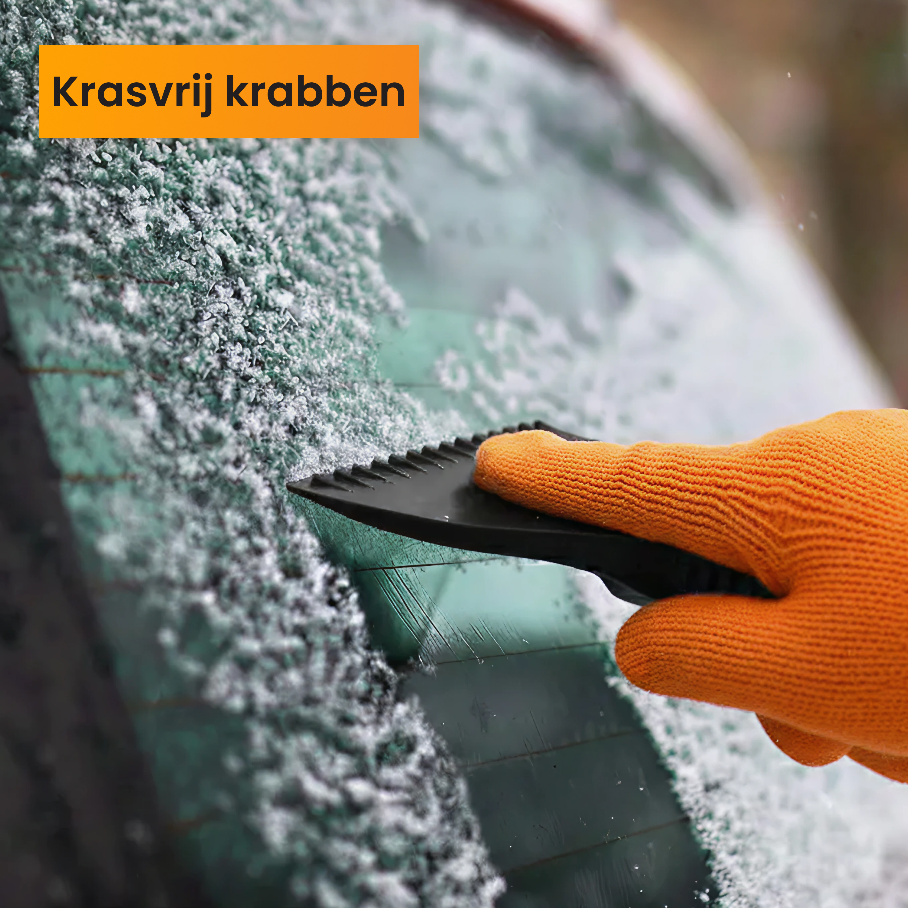 A gloved hand scrapes ice from a car window. The glove is orange, the scraper is black, and ice covers the glass.
