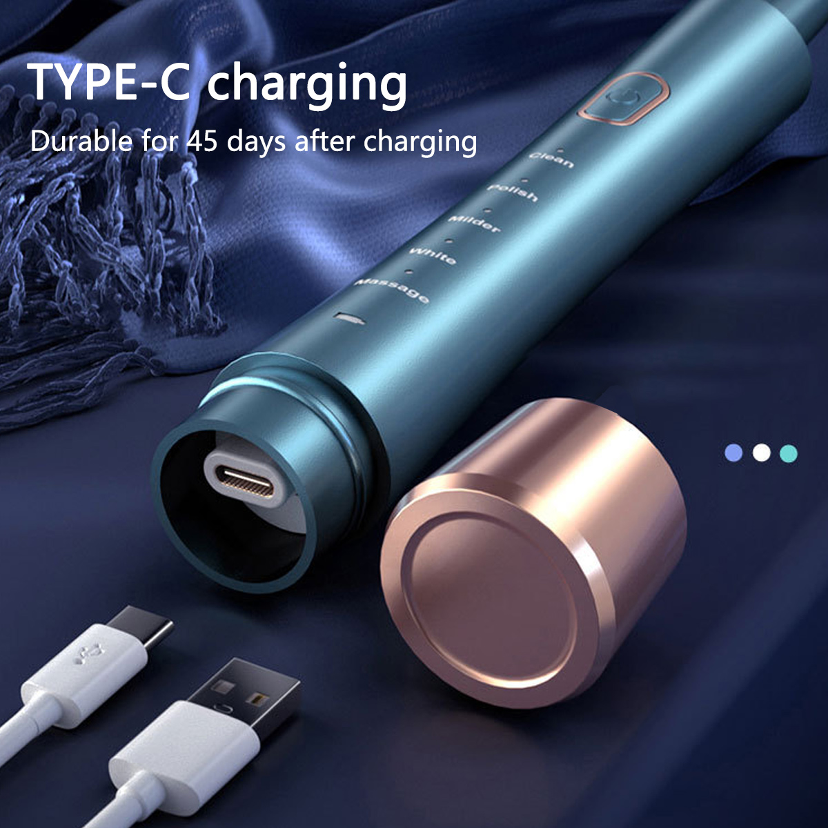 Eine blaue elektrische Zahnbürste mit Typ-C-Ladeanschluss, kupferfarbener Kappe und zwei weißen Ladekabeln.
