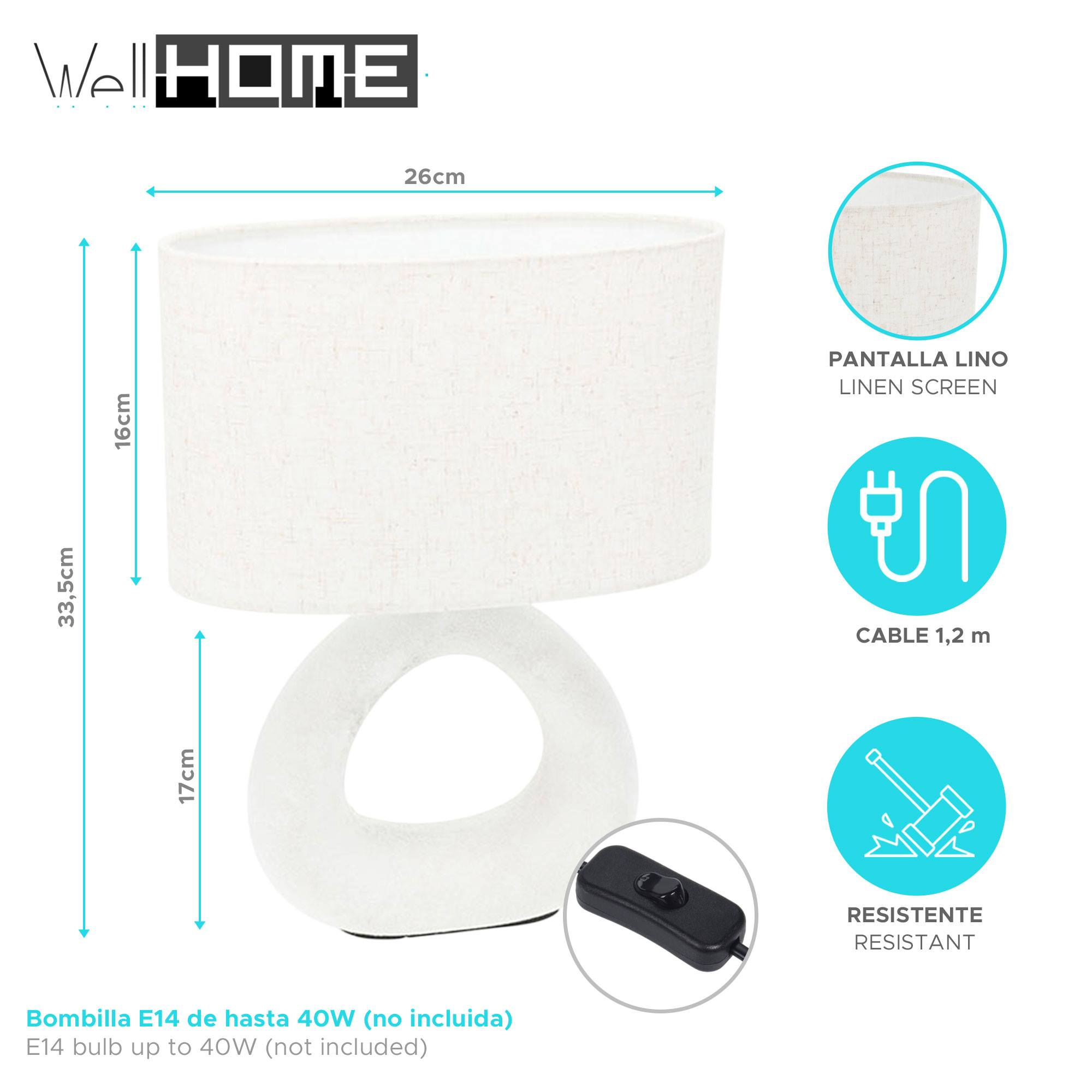 Una lámpara de mesa blanca con pantalla de lino. Tiene una base redondeada y un interruptor negro.