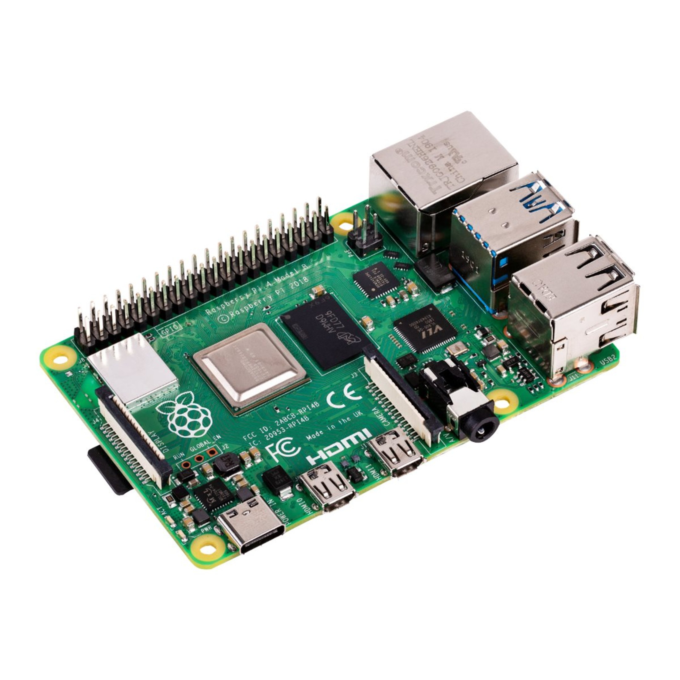 Un circuito stampato Raspberry Pi verde con connettori, chip e porte. Ha un dissipatore di calore metallico e porte USB.