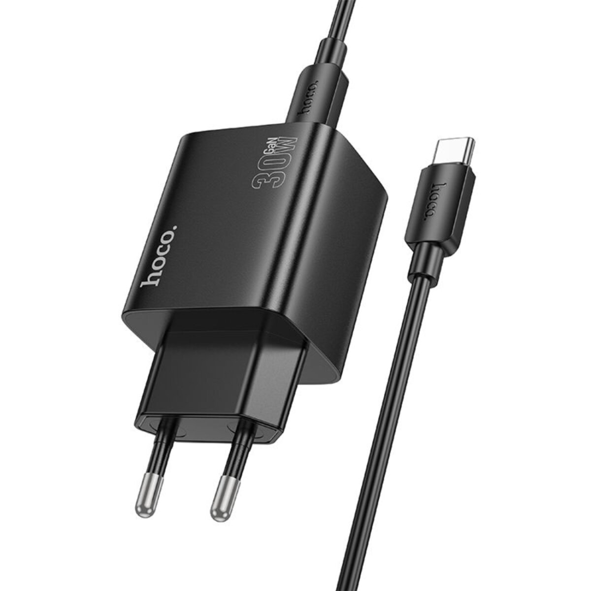 Un chargeur Hoco noir de 30W avec un câble USB-C. Le chargeur a deux broches et le nom de la marque.