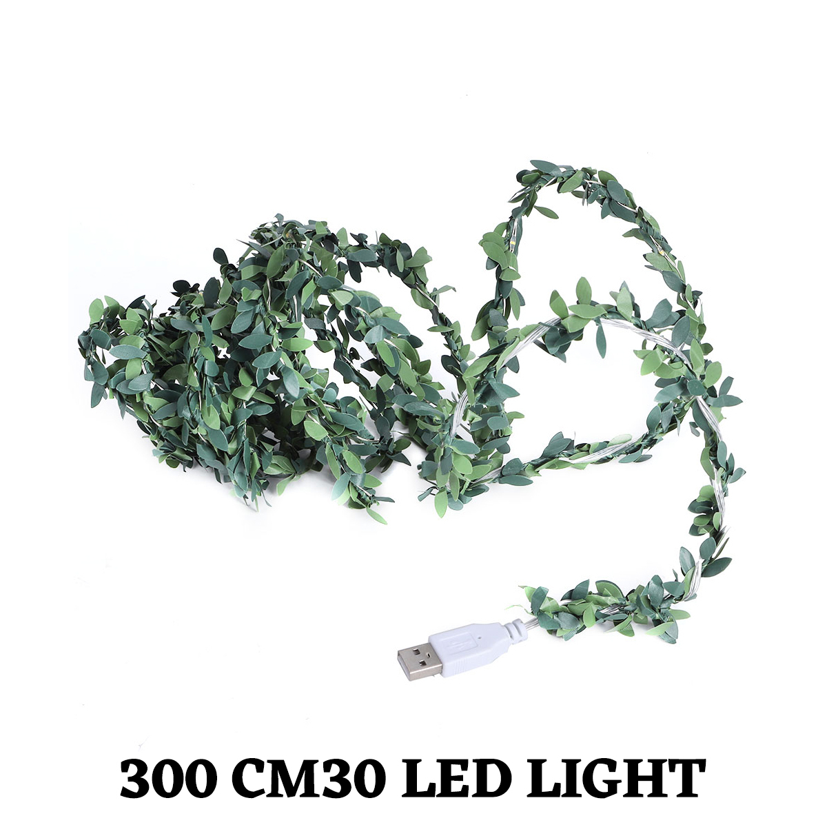 Ein grüner Blättergirlande mit USB-Stecker liegt auf Weiß. Der Text unten lautet: 300 CM30 LED LIGHT.