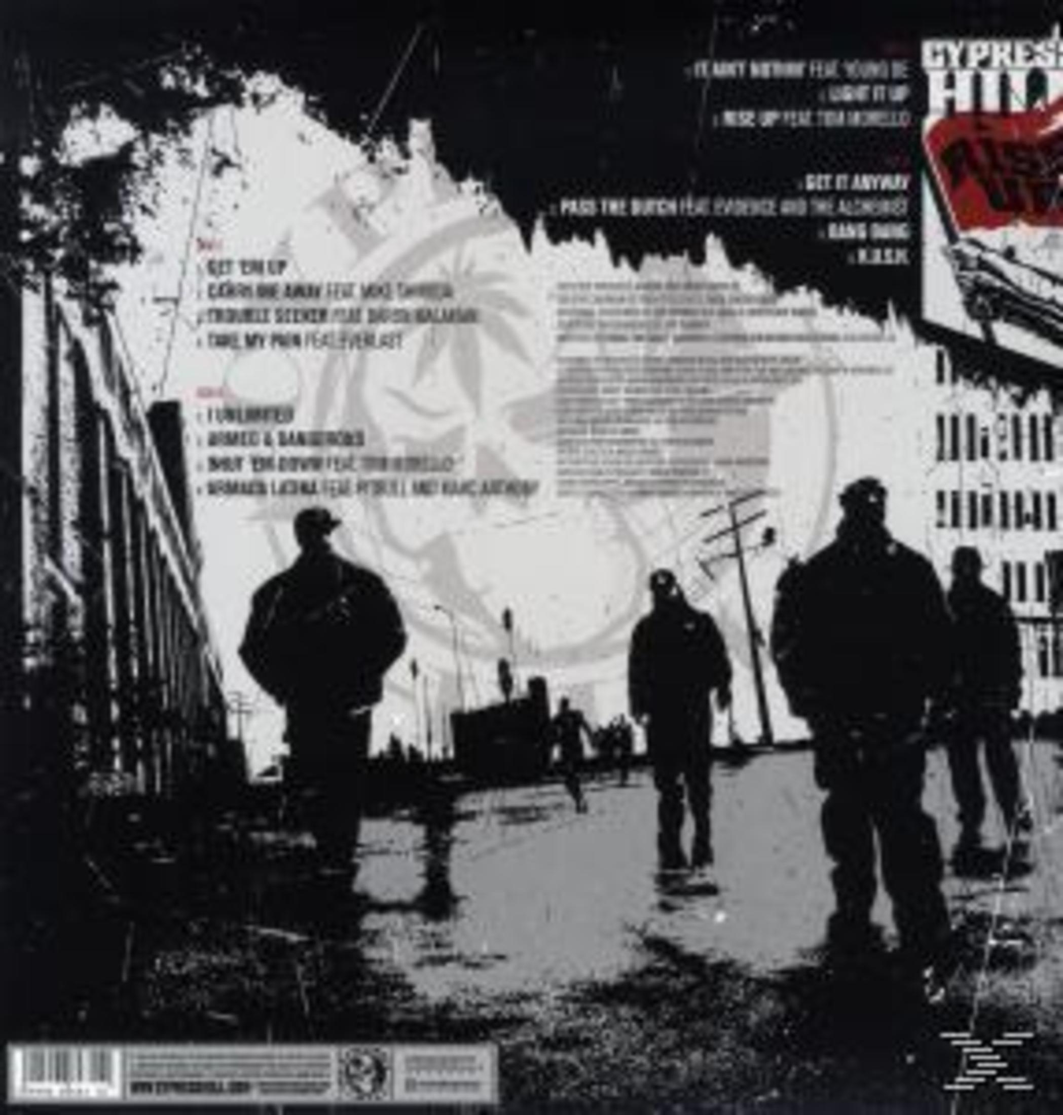 Albumcover: Silhouetten von Figuren gehen auf einer Straße vor Gebäuden. Text über das Album ist sichtbar.