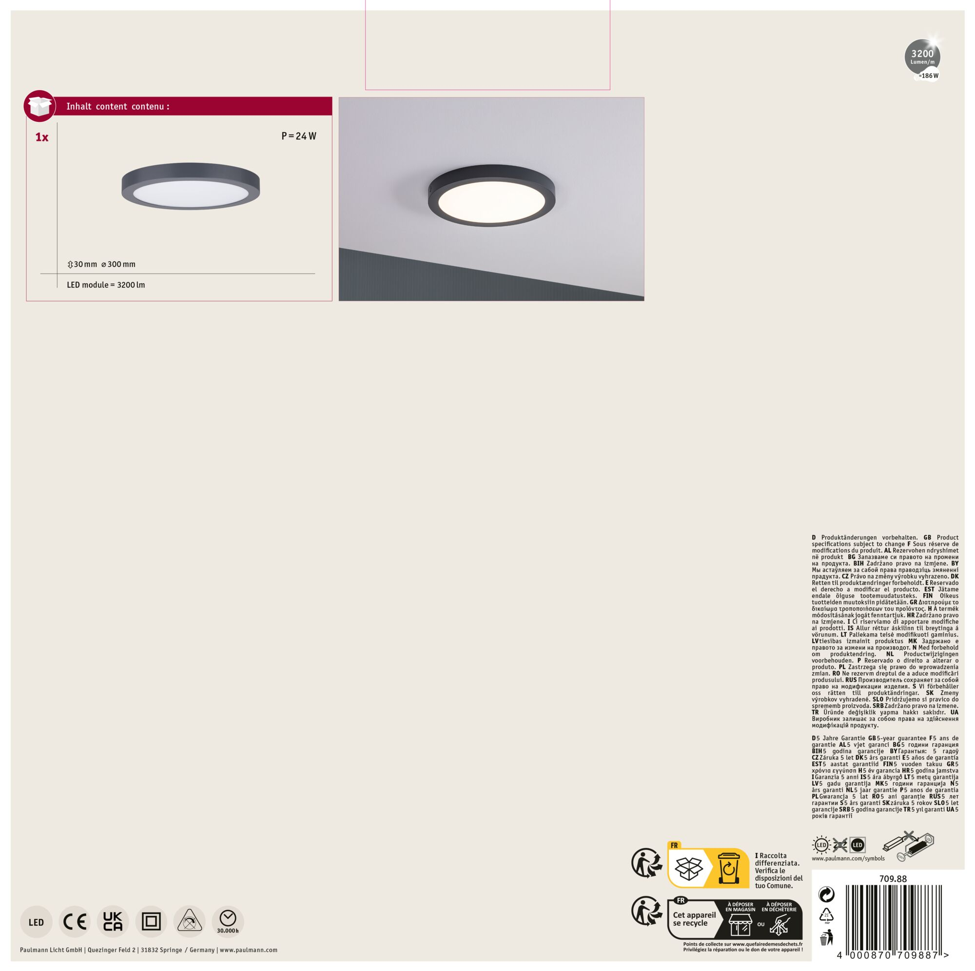 Una lampada da soffitto rotonda grigio scuro con un centro bianco brillante, su un soffitto bianco.