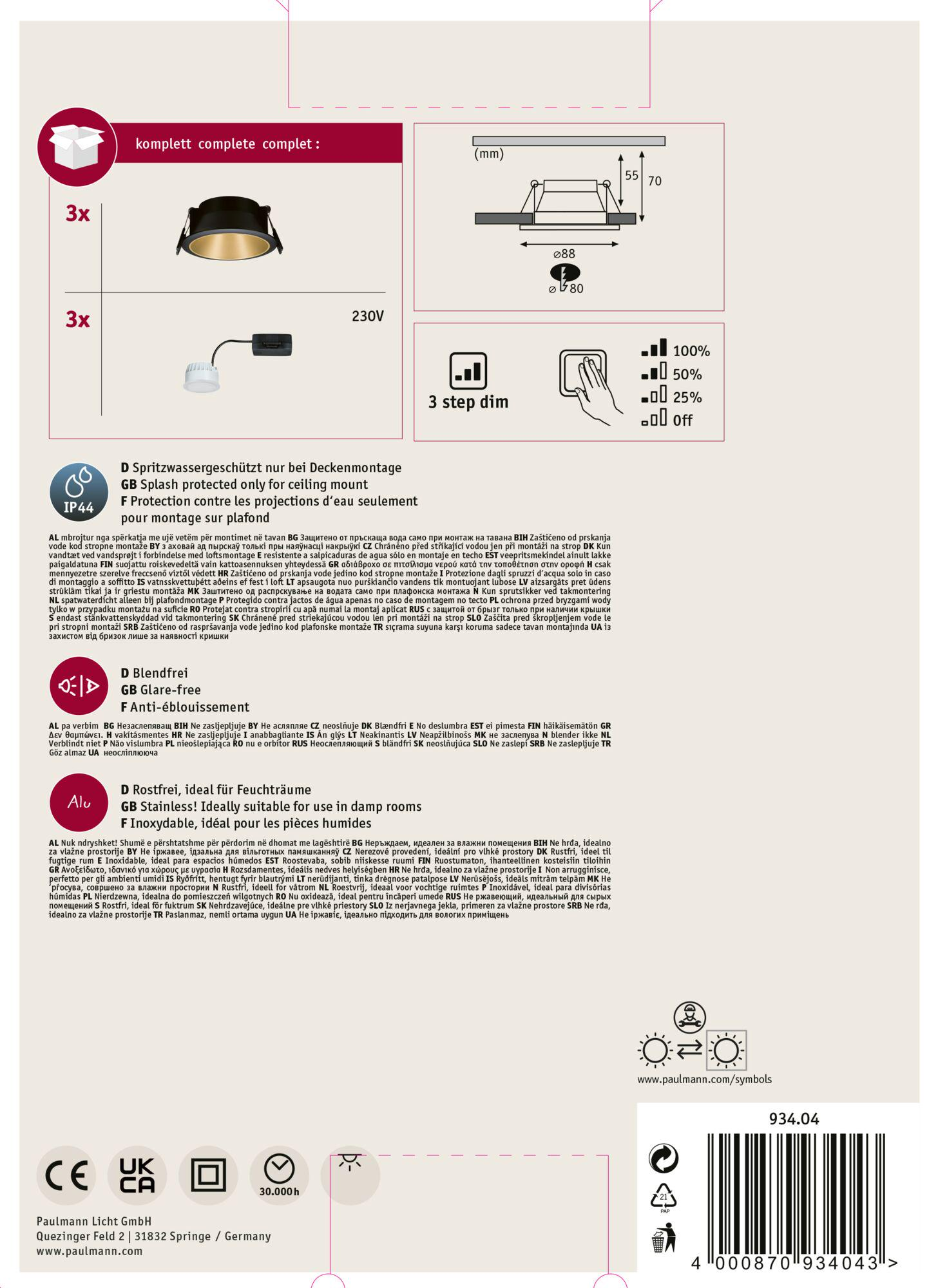 Białe pudełko produktu z czarnym reflektorem i małym ściemniaczem. Widoczny tekst i symbole.