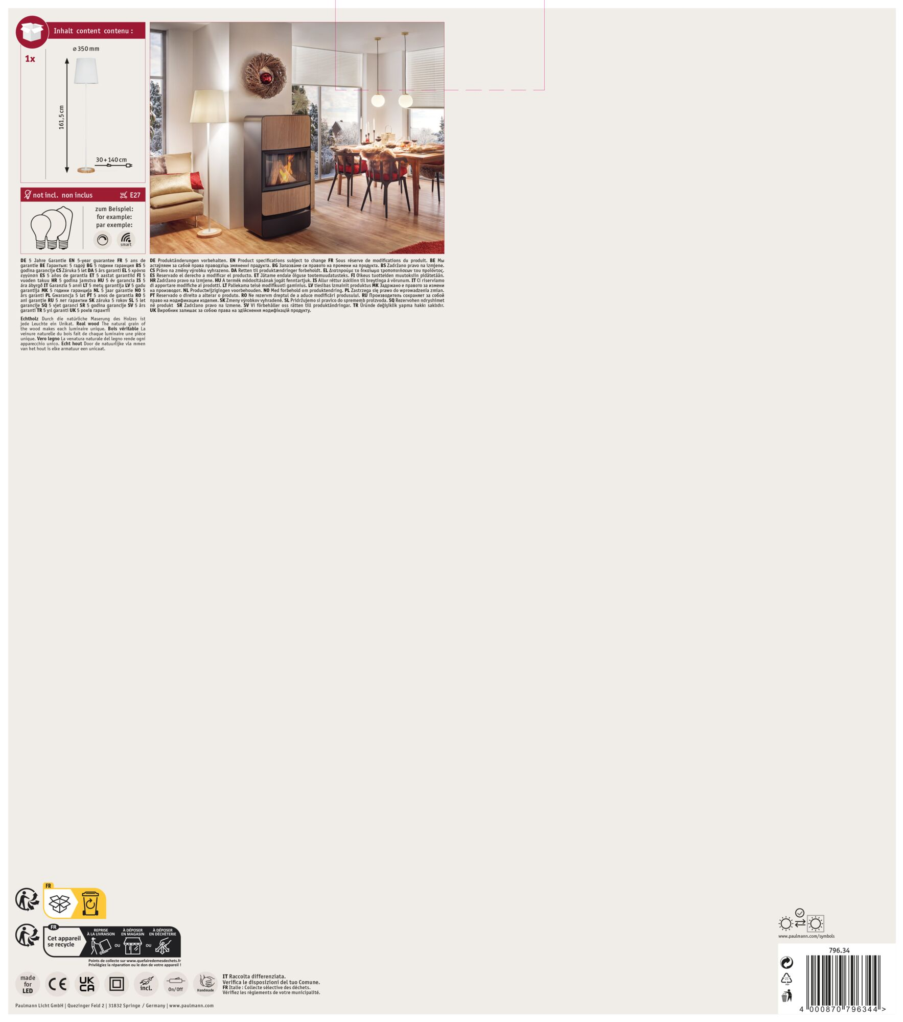 Pokój z kominkiem, lampą i stołem jadalnym, z kartą informacyjną o produkcie.