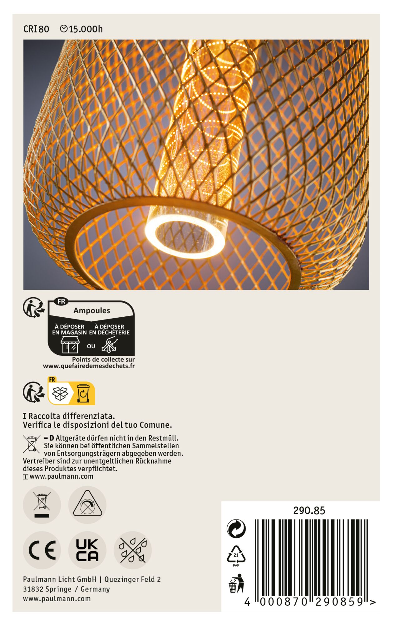 Dekoracyjna lampa ze złotym kloszem z siatki drucianej. Żarówka jest widoczna. Różne symbole i tekst na opakowaniu.