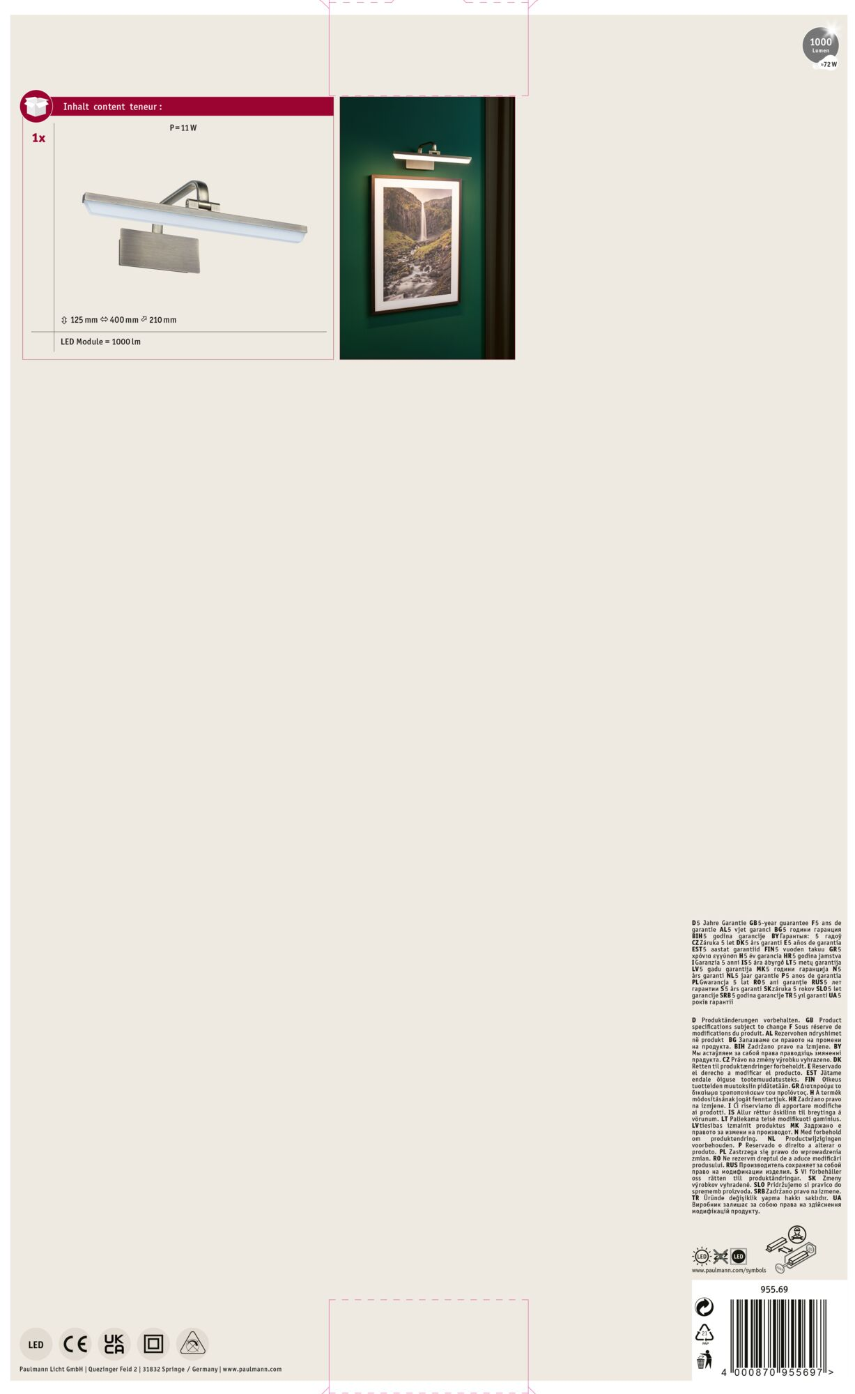 Nowoczesna lampa LED jest zamontowana nad oprawionym obrazem krajobrazu na zielonej ścianie.