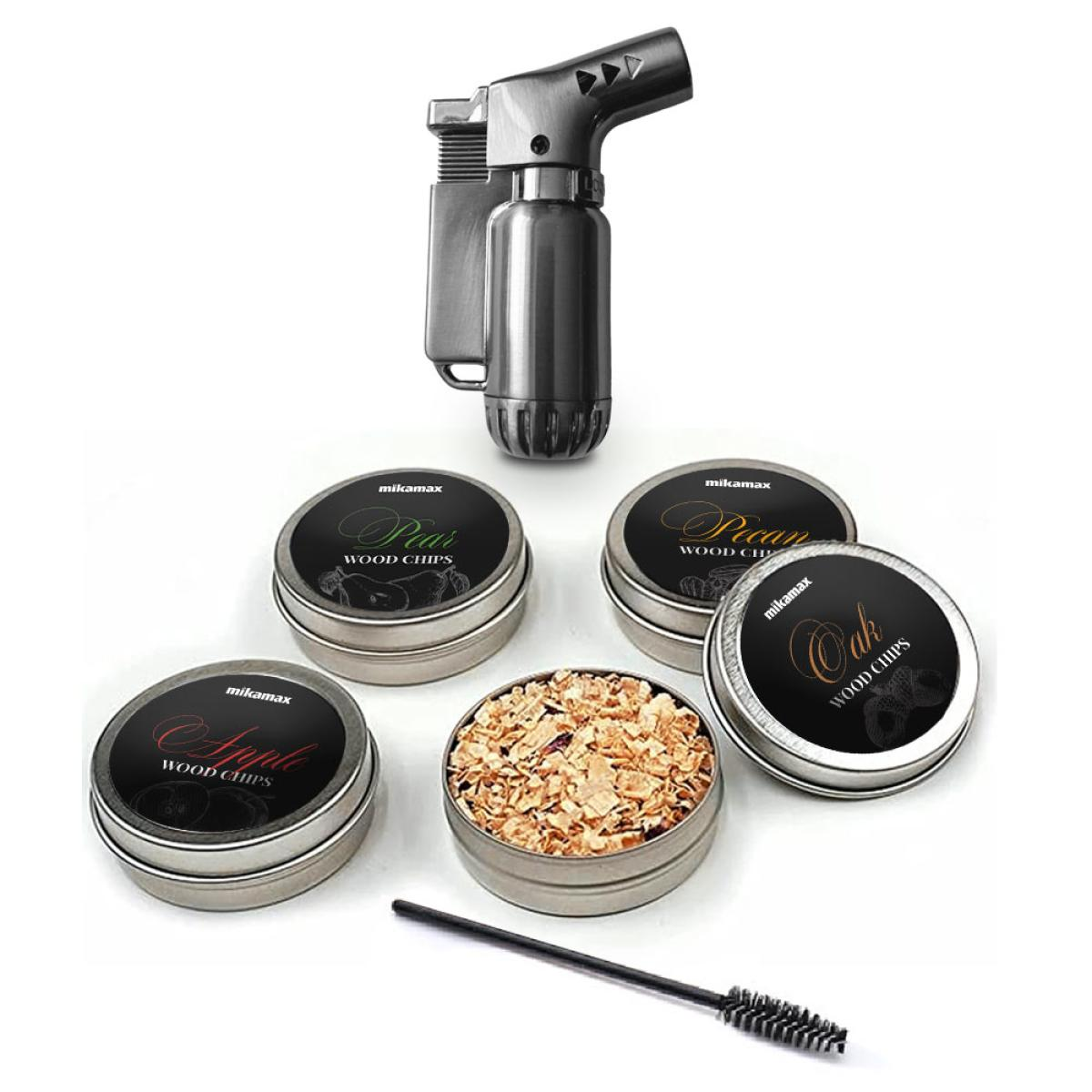 A metal torch with wood chip tins labeled Apple, Pear, Pecan, and Oak. A brush is at the bottom, all on a white surface.