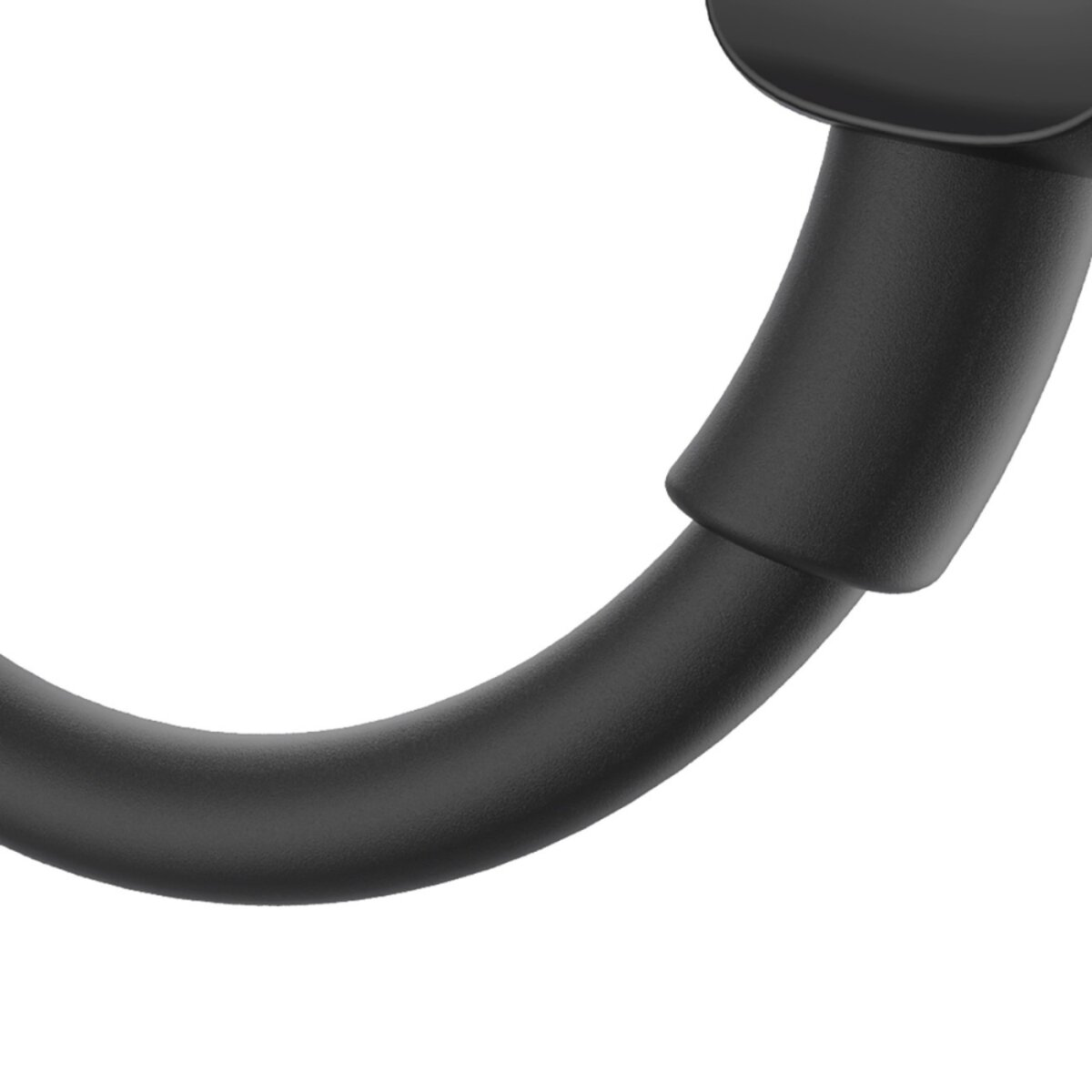 Gros plan d'un objet noir et incurvé sur fond blanc. L'objet semble être fait d'un matériau lisse.