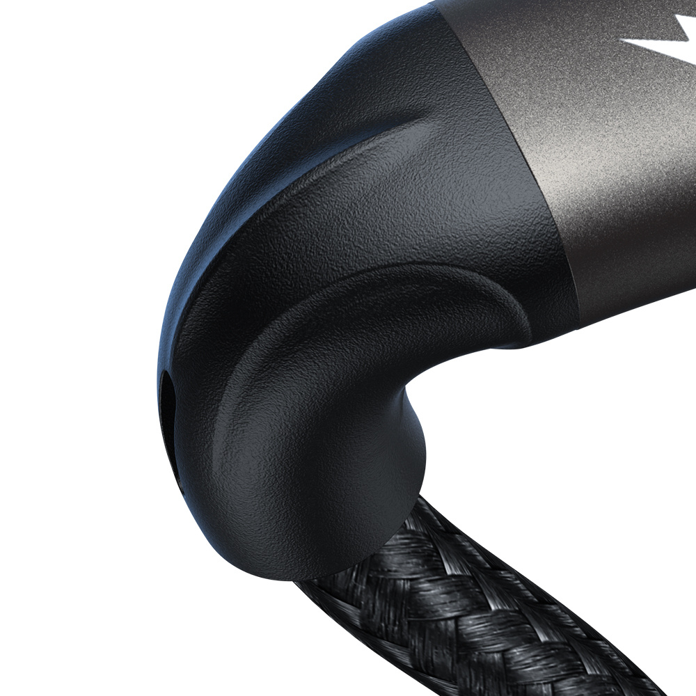 Close-up of a black, textured curved object with a braided black cable emerging. A metallic gray section is visible.