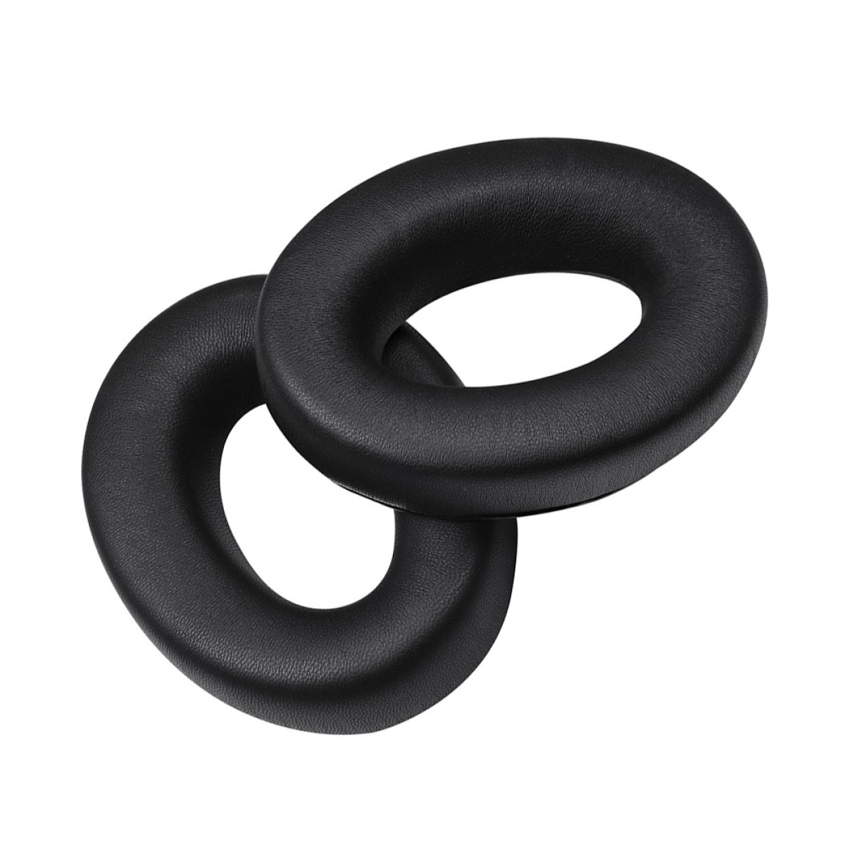 Due cuscinetti auricolari neri e circolari, forse per cuffie, sono posizionati insieme su sfondo bianco.