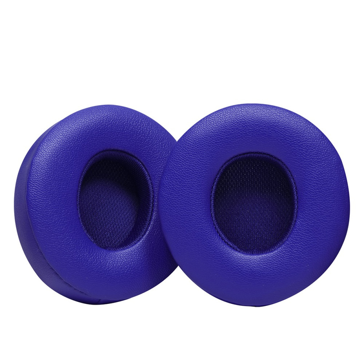Due cuscinetti auricolari blu per cuffie, ciascuno con un'apertura centrale e una superficie strutturata, su sfondo bianco.