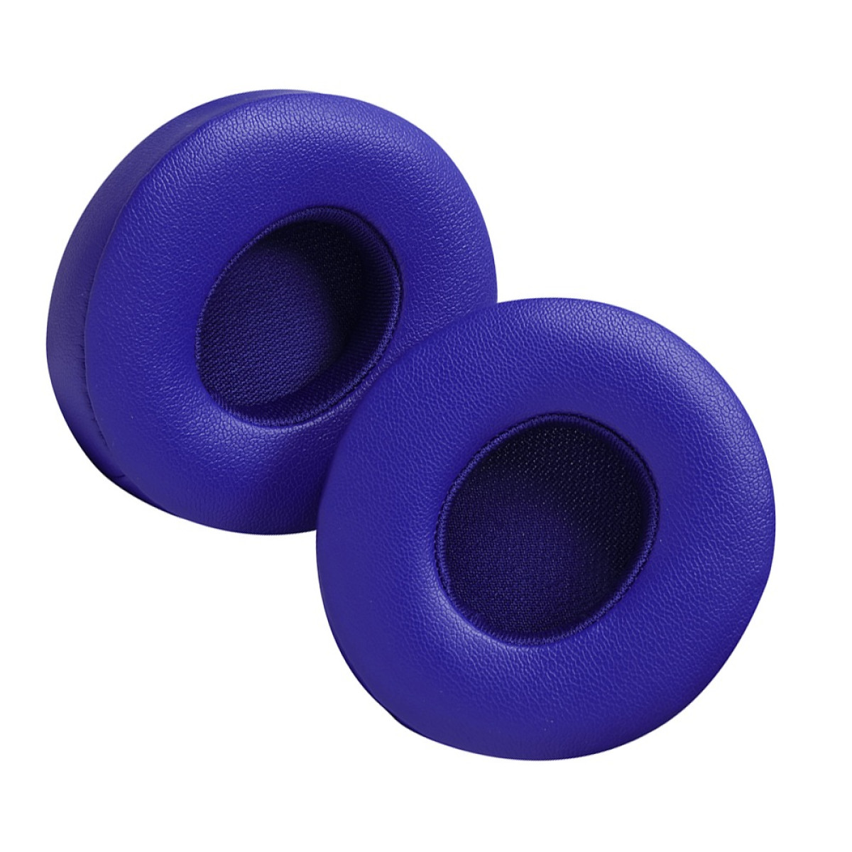 Vengono mostrati due cuscinetti auricolari blu per cuffie. Sono rotondi con un foro al centro. Sfondo bianco.