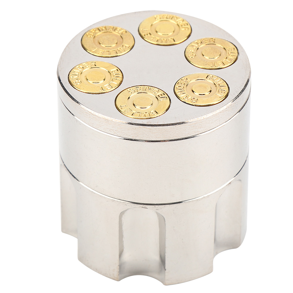 Ein metallischer zylindrischer Grinder mit sechs kugelähnlichen Deckeln oben. Die Deckel sind goldfarben, der Körper silber.