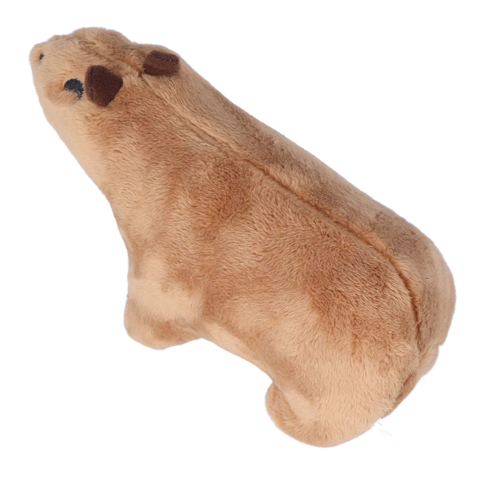 Ein braunes Plüsch-Capybara-Spielzeug, aus einem Winkel betrachtet. Es hat kleine dunkelbraune Ohren und Augen und befindet sich auf weißem Hintergrund.