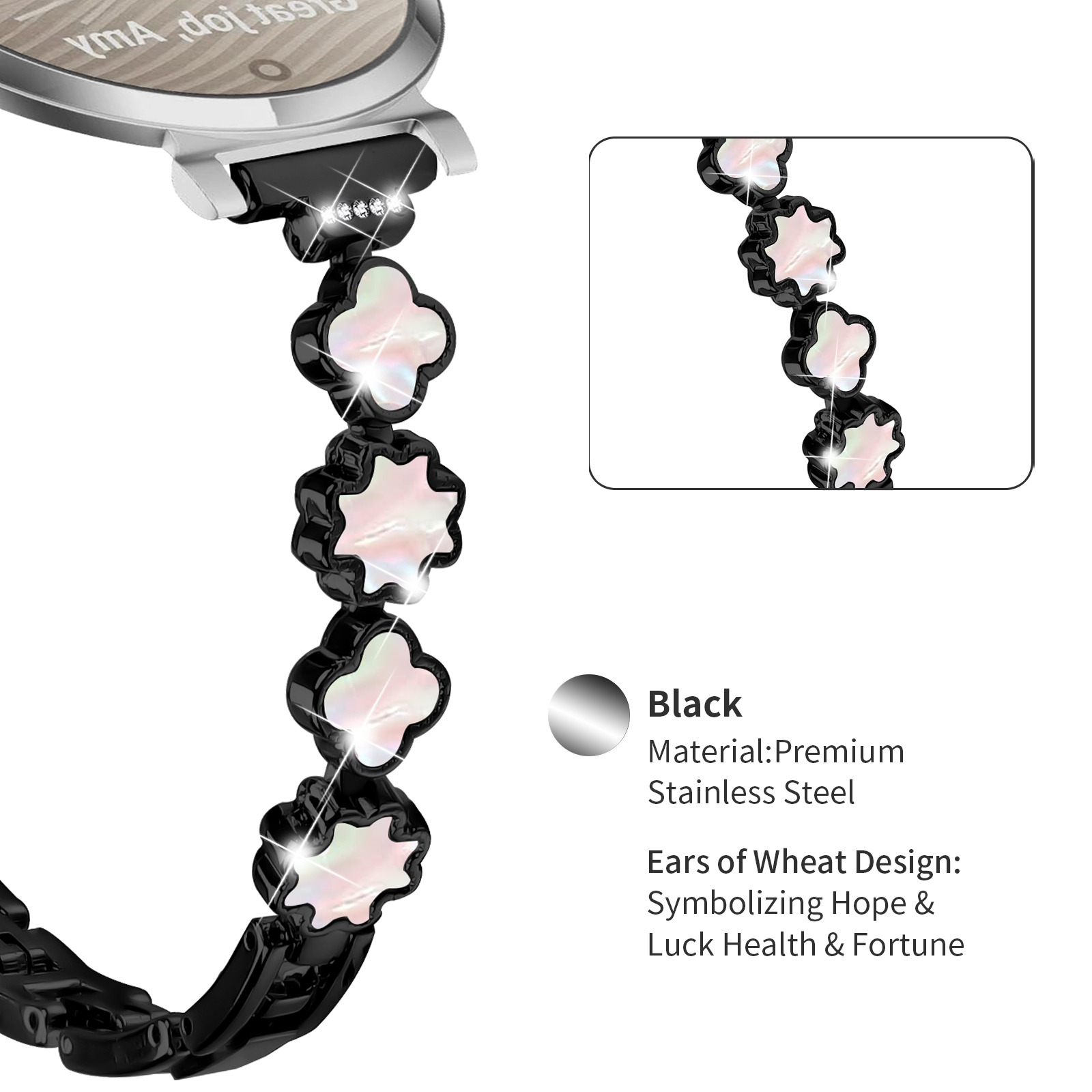 Cinturino nero con maglie a forma di quadrifoglio, con intarsi perlacei. Acciaio inossidabile. Testo: Design a spighe, simboleggia la speranza.