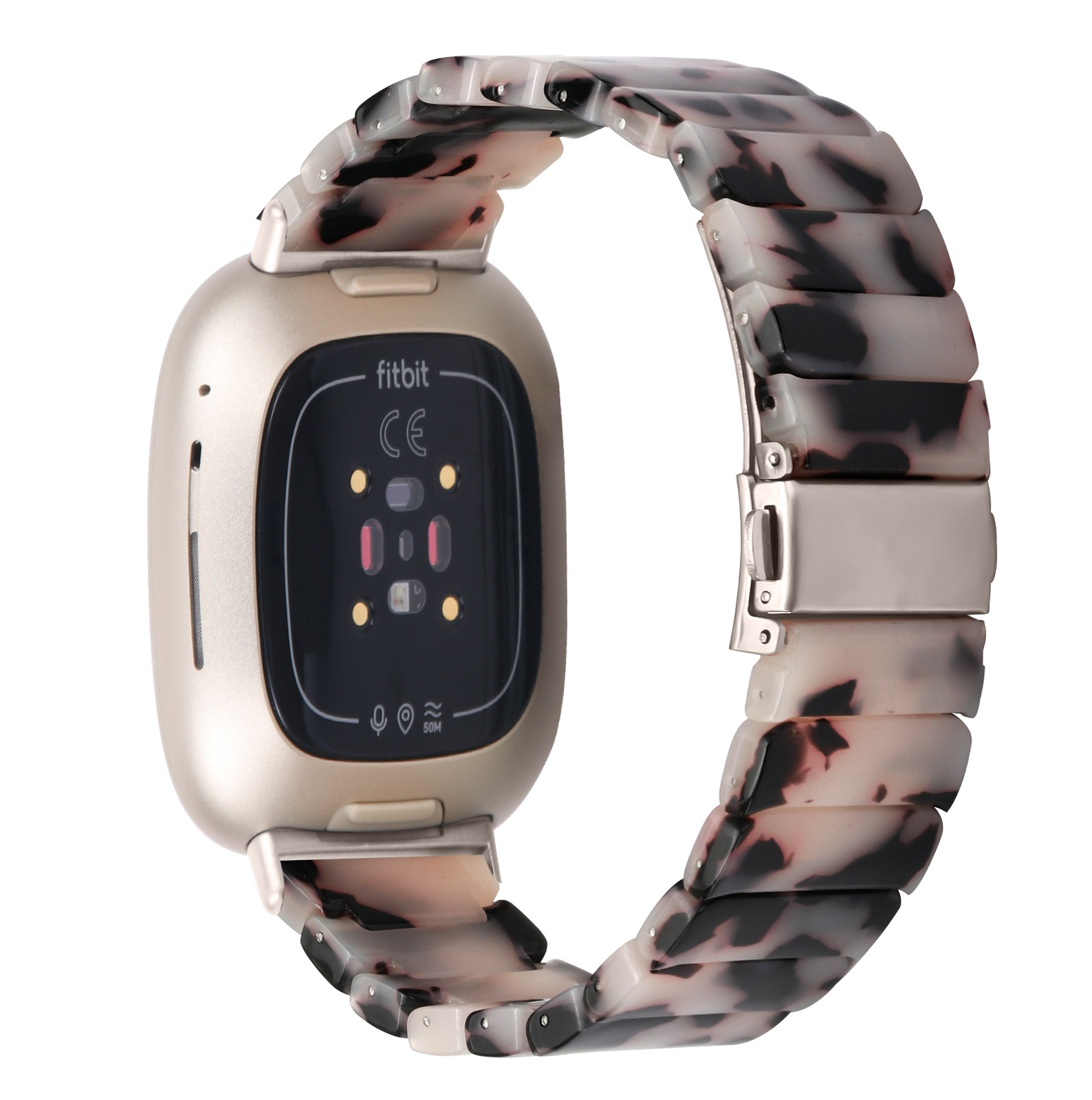 Eine Fitbit-Smartwatch mit gemustertem Armband. Das Zifferblatt ist goldfarben und das Armband ist weiß mit schwarzen Punkten.